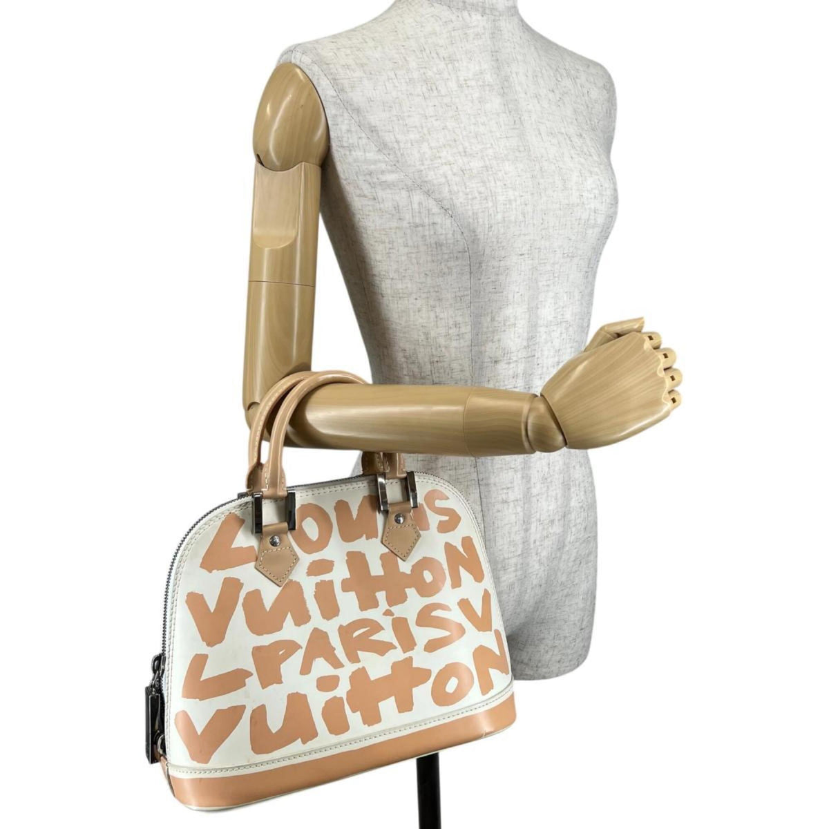 Louis Vuitton Beige Leather Handbag (Pre-Owned)