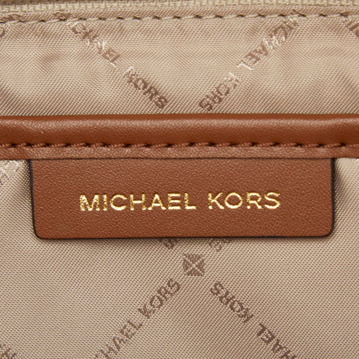 Michael Kors Brown White Pvc Leather Backpack (Pre-Owned)