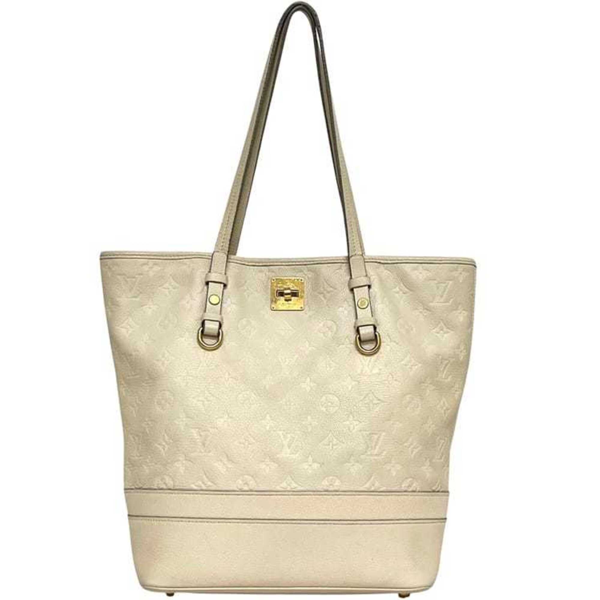Louis Vuitton Beige Neige White Monogram Empreinte Leather Tote Bag (Pre-Owned)