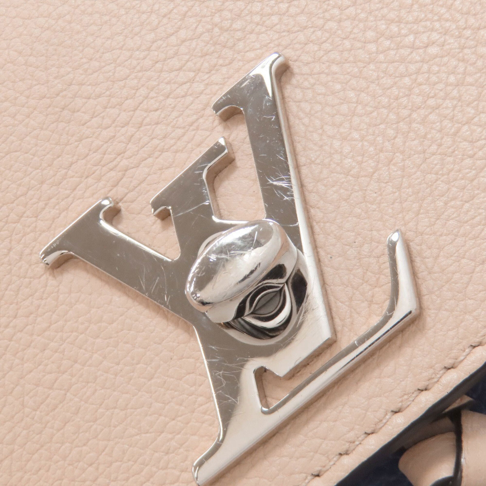 Louis Vuitton Beige Blue Leather Backpack (Pre-Owned)