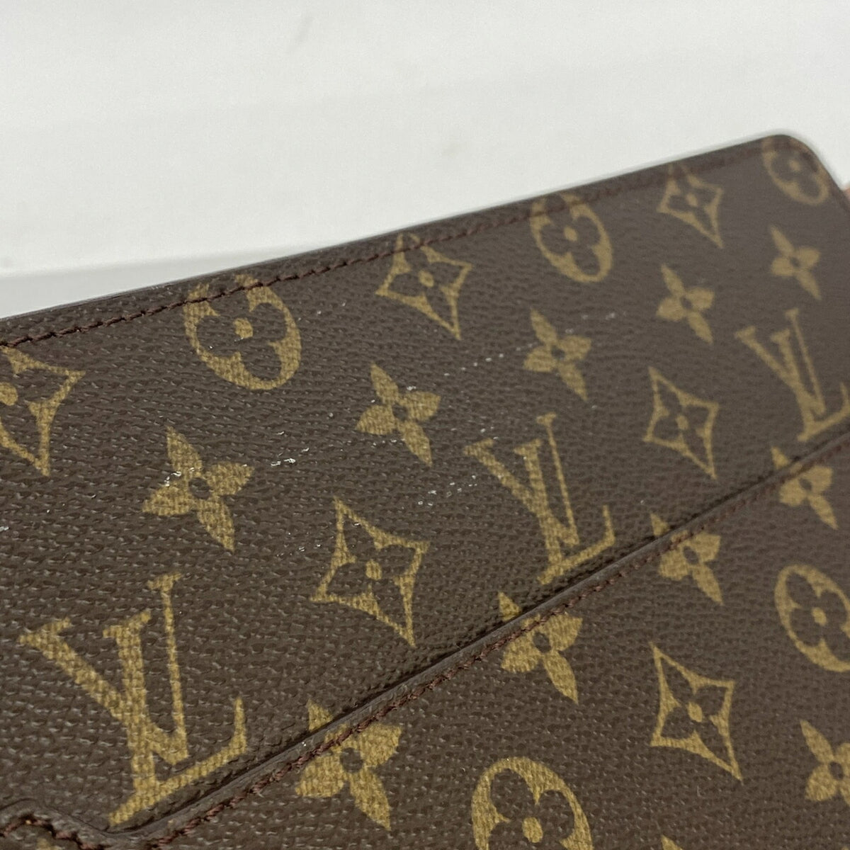 Louis Vuitton Brown Clutch Bag (Pre-Owned)