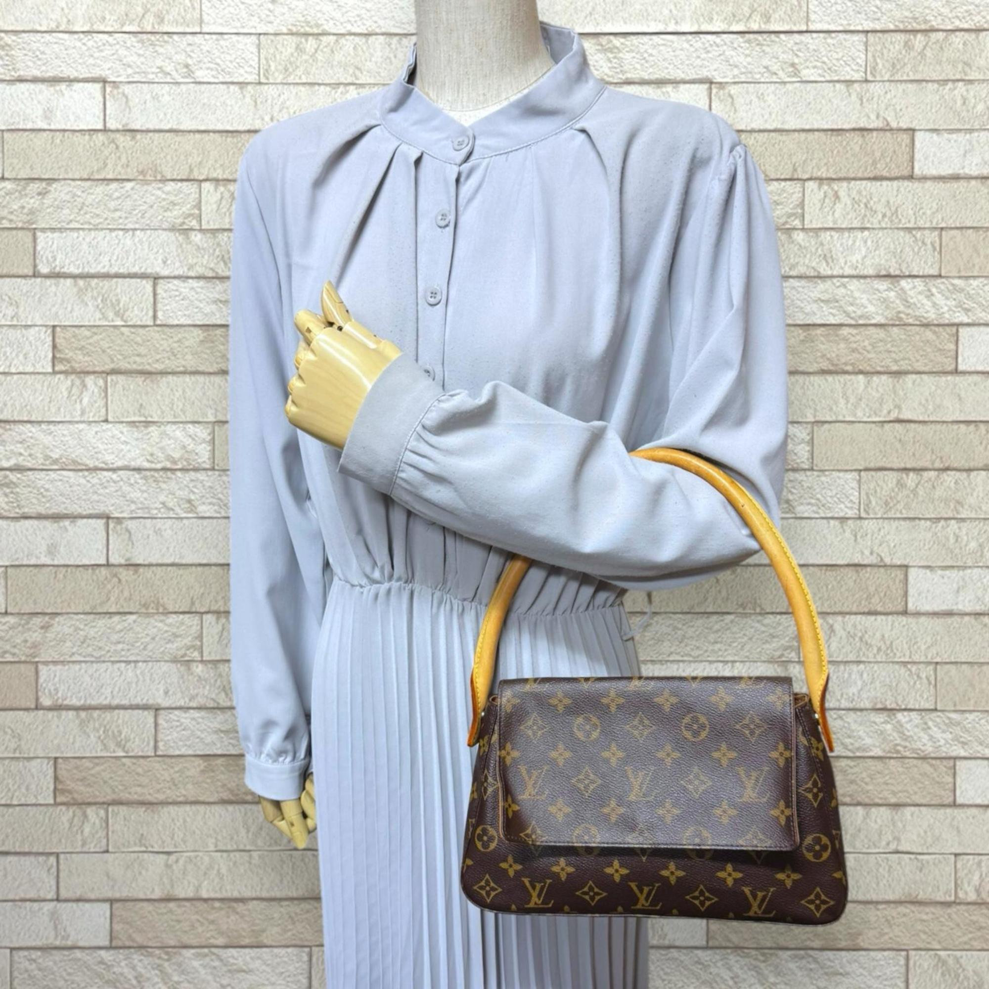 Louis Vuitton Brown Monogram Canvas Handbag (Pre-Owned)