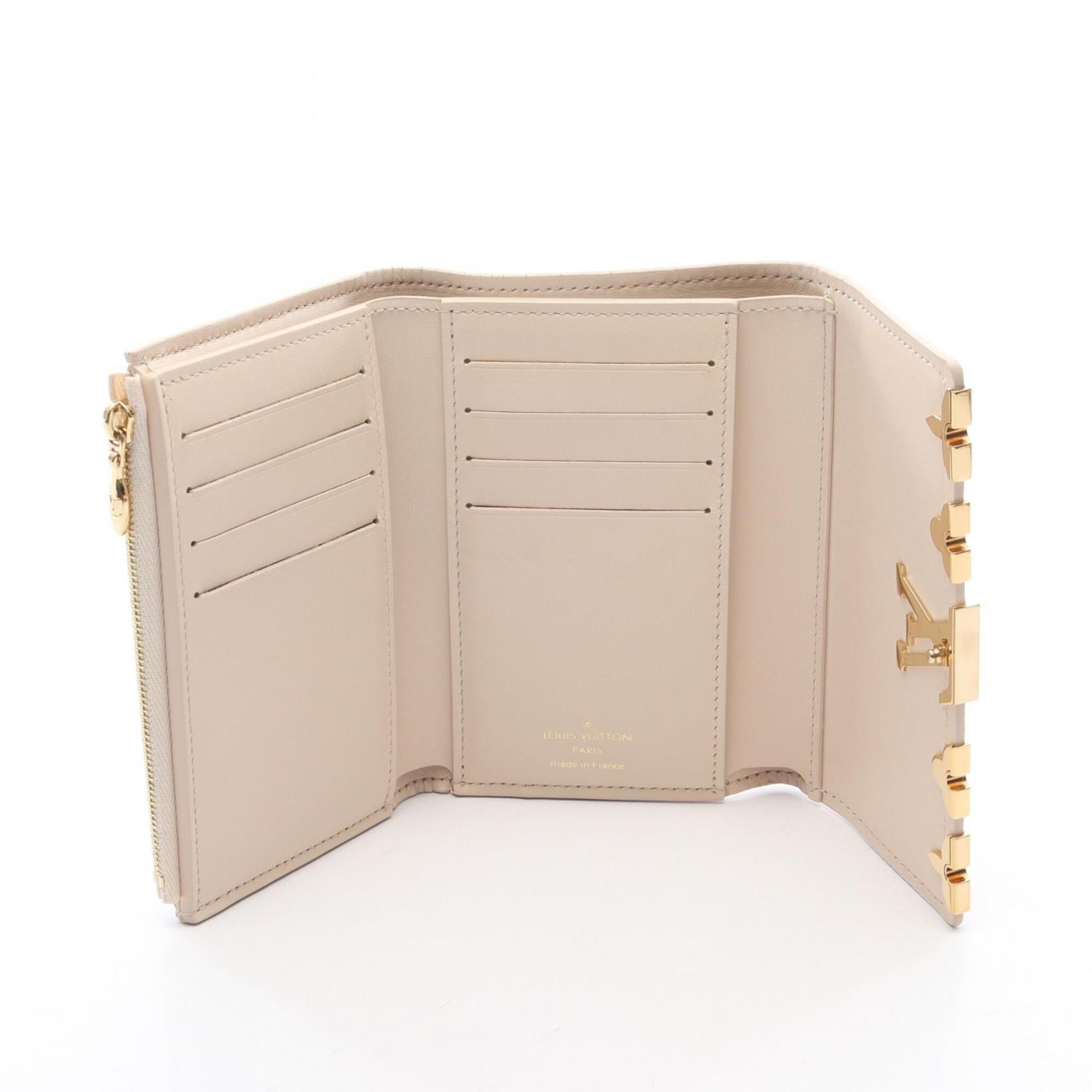 Louis Vuitton Ivory Leather Wallet (Tri-Fold) (Pre-Owned)