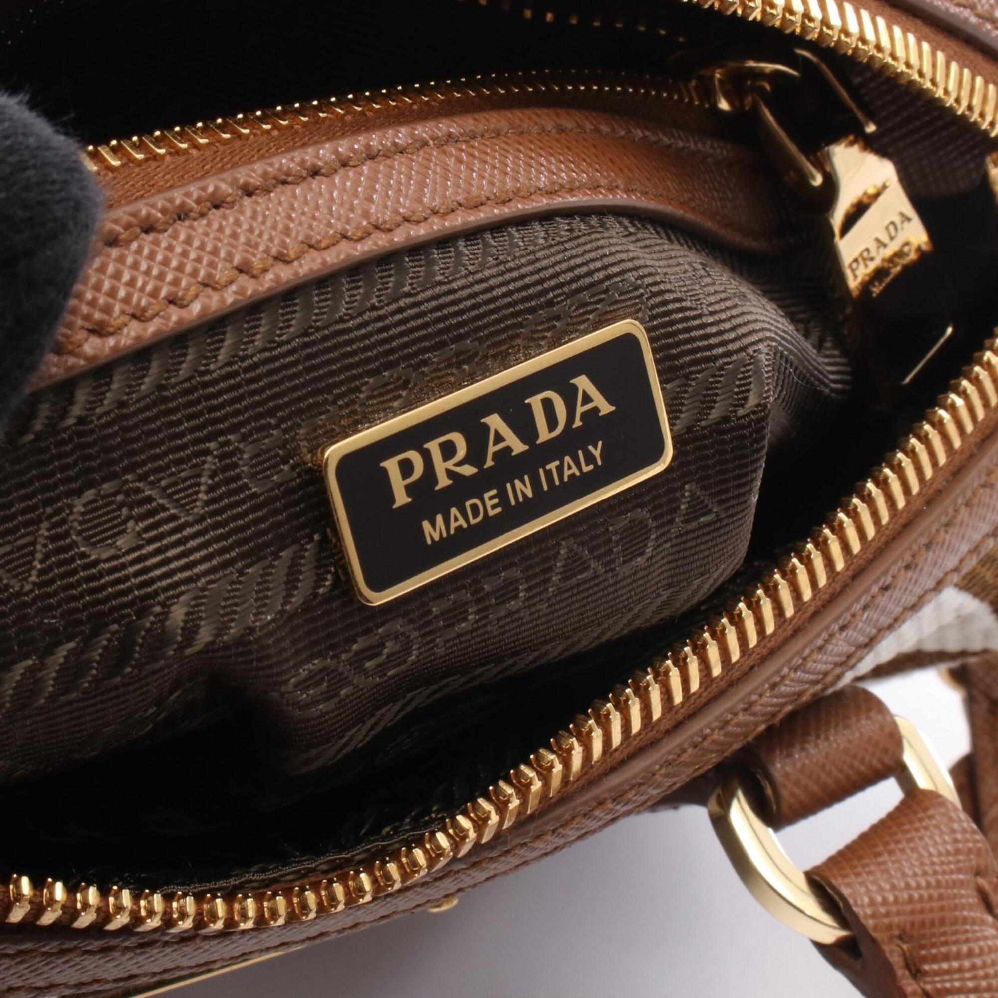 Prada Brown White Canvas Leather Handbag (Pre-Owned)