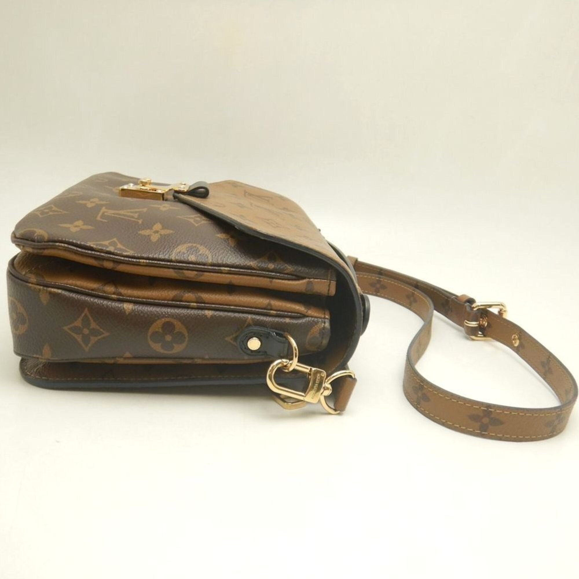 Louis Vuitton Brown Monogram Handbag (Pre-Owned)