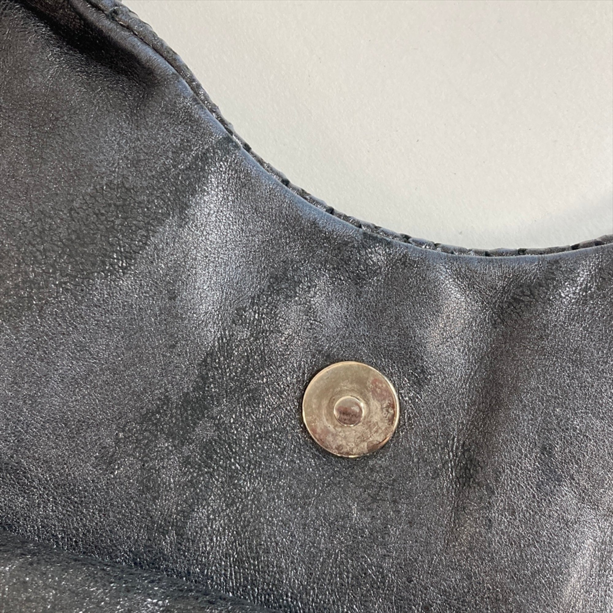 Chanel Black Metallic Leather Handbag (Pre-Owned)