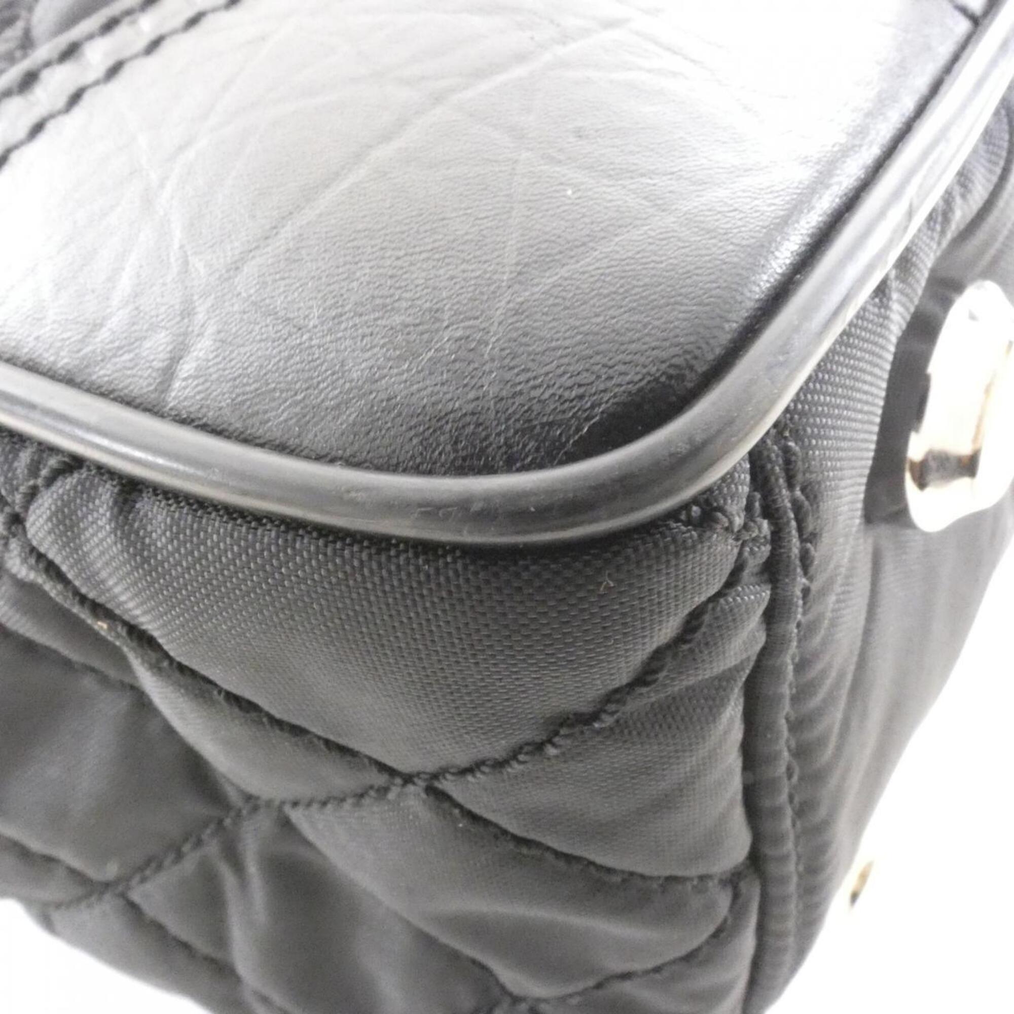 Chanel Black Nylon Leather Handbag (Pre-Owned)