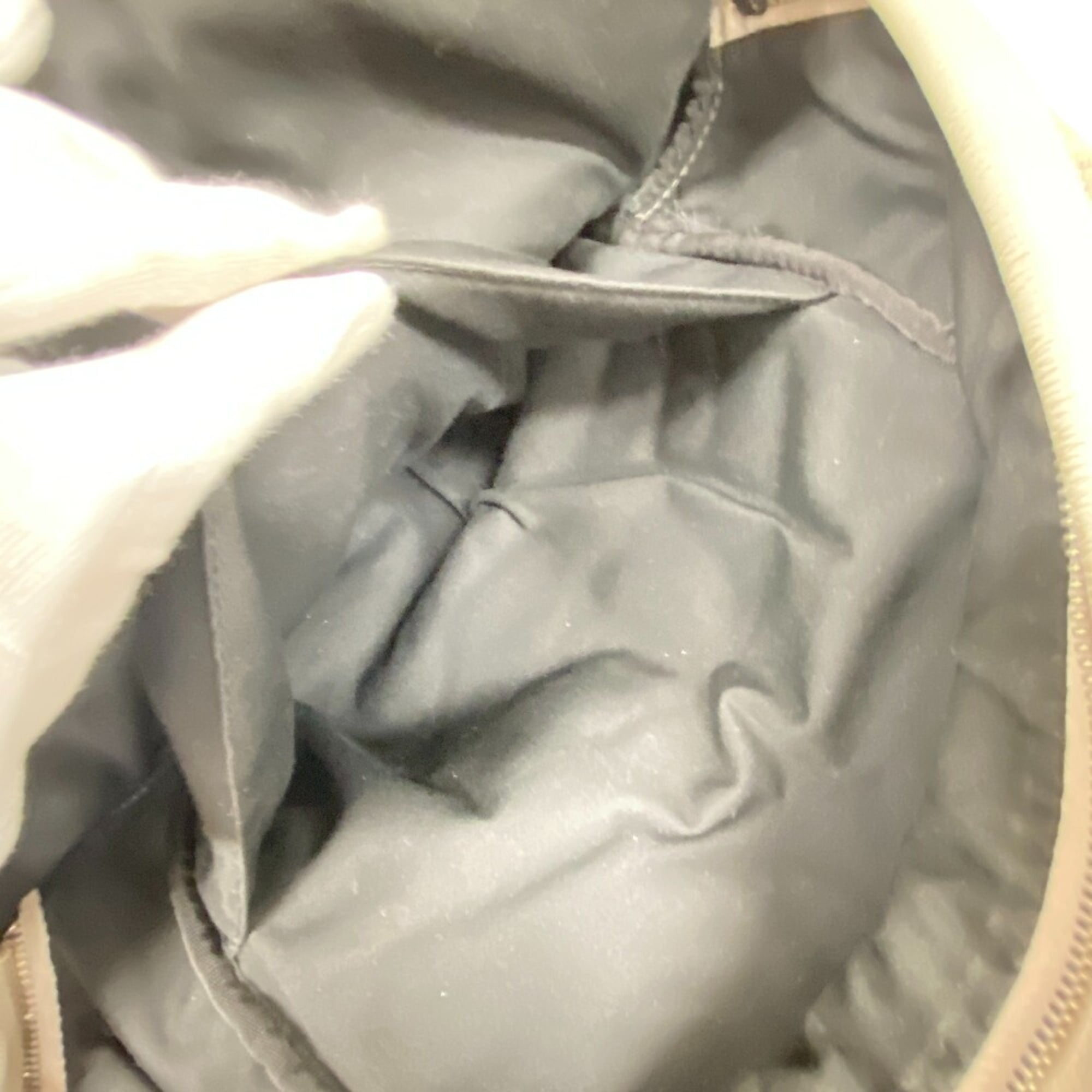 Christian Dior Trotter White Canvas Backpack (Pre-Owned)