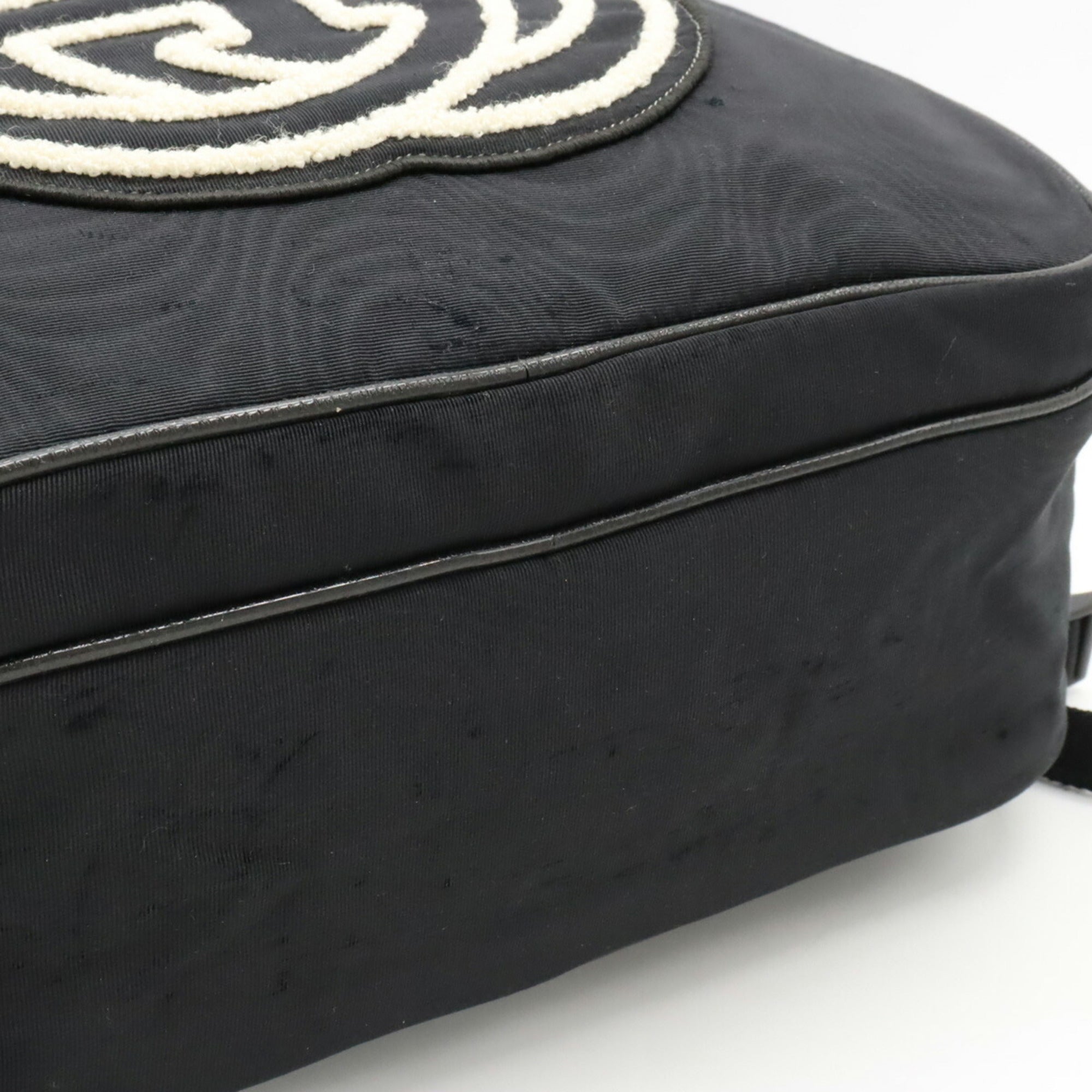 Gucci Black Nylon Canvas Spangles Leather Backpack (Pre-Owned)