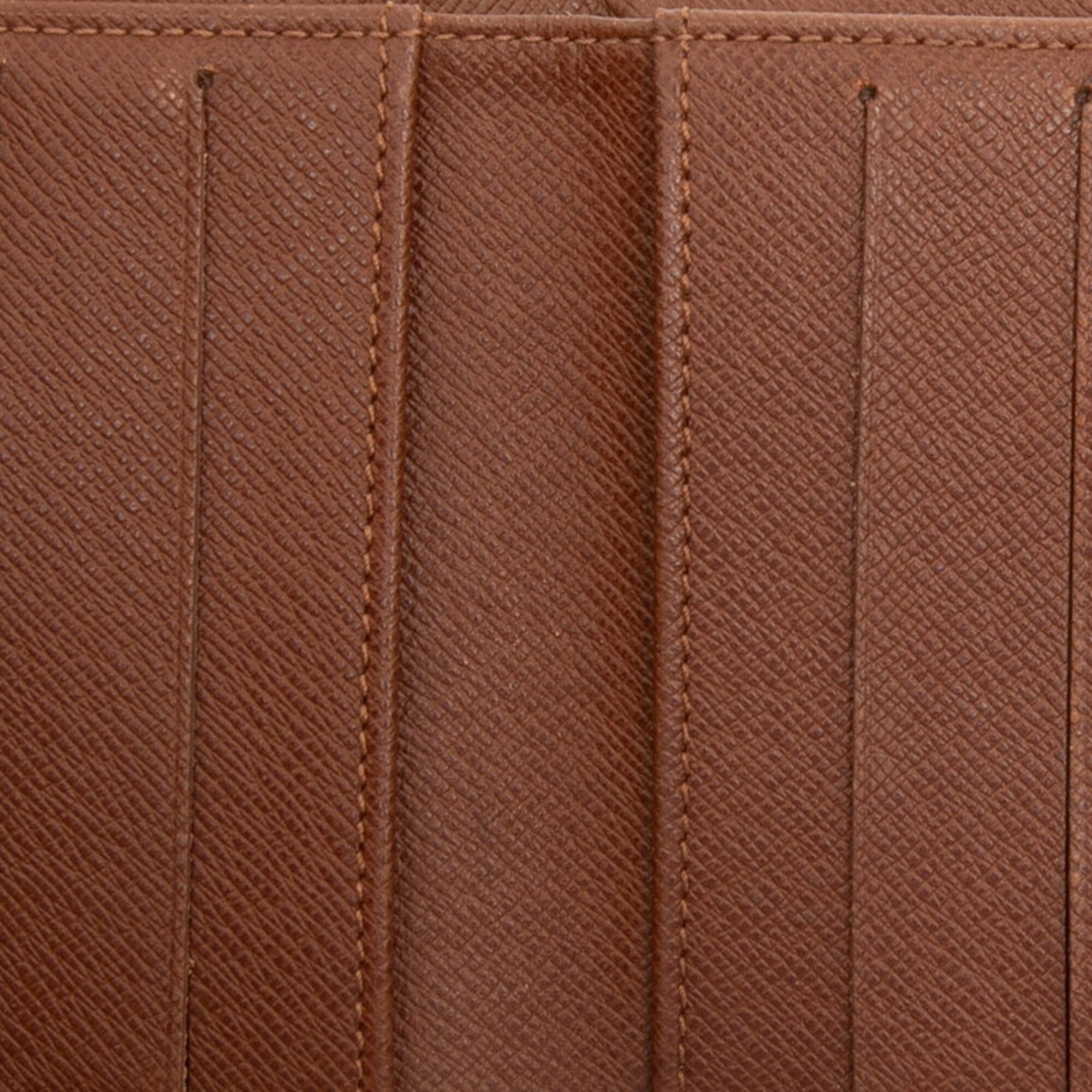Louis Vuitton Brown Monogram Pvc Leather Wallet (Tri-Fold) (Pre-Owned)