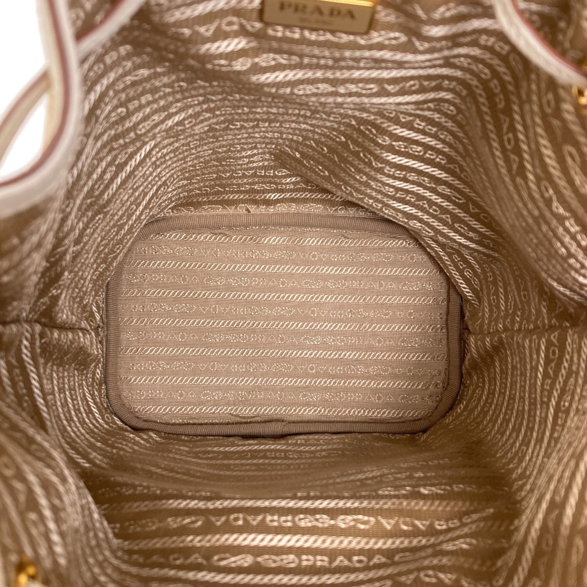Prada Beige White Canvas Handbag (Pre-Owned)