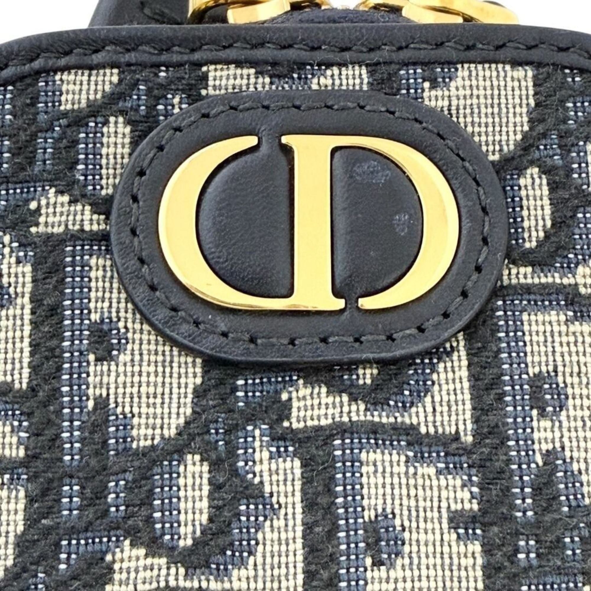 Christian Dior Leather Canvas Metal Handbag (Pre-Owned)