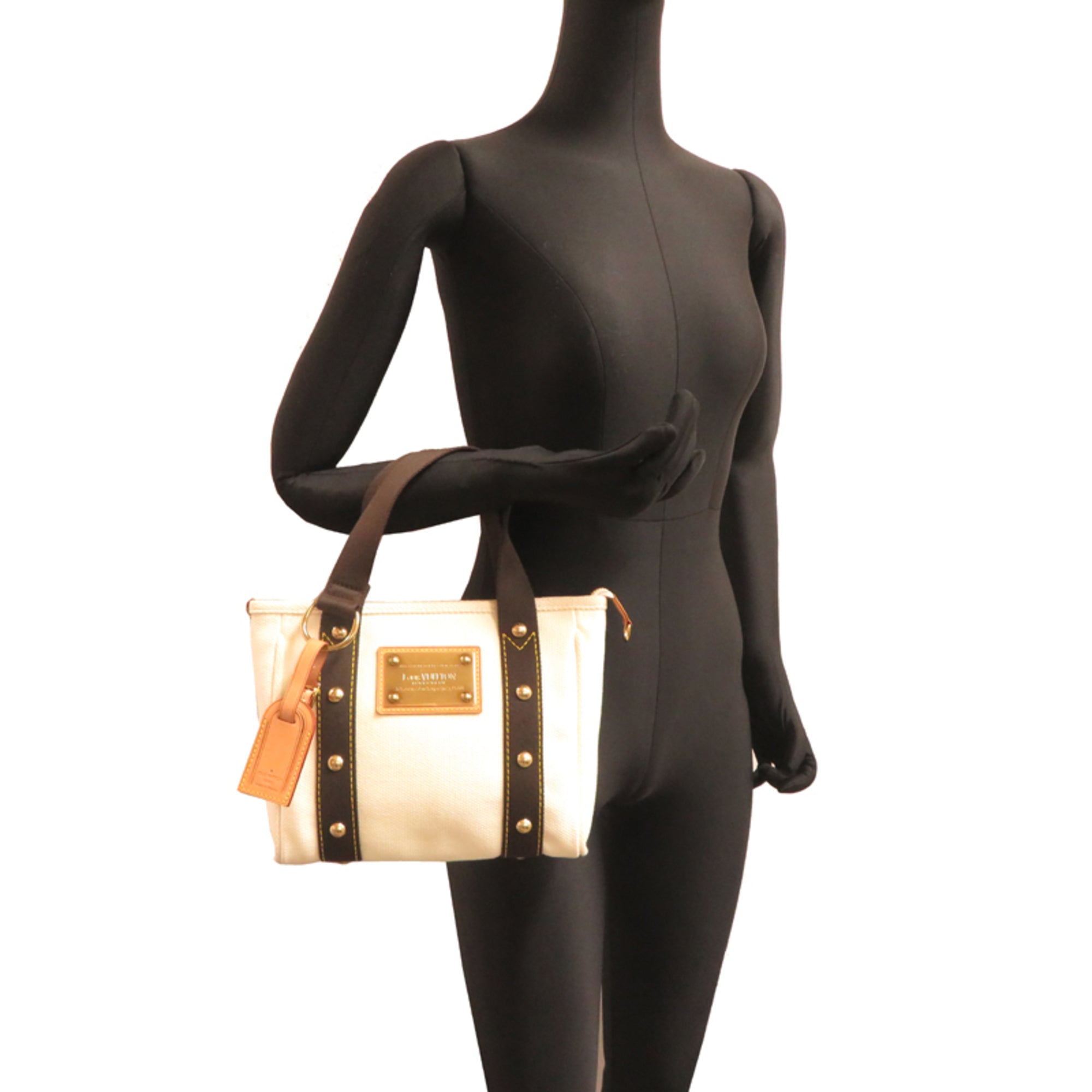 Louis Vuitton Brown White Canvas Handbag (Pre-Owned)