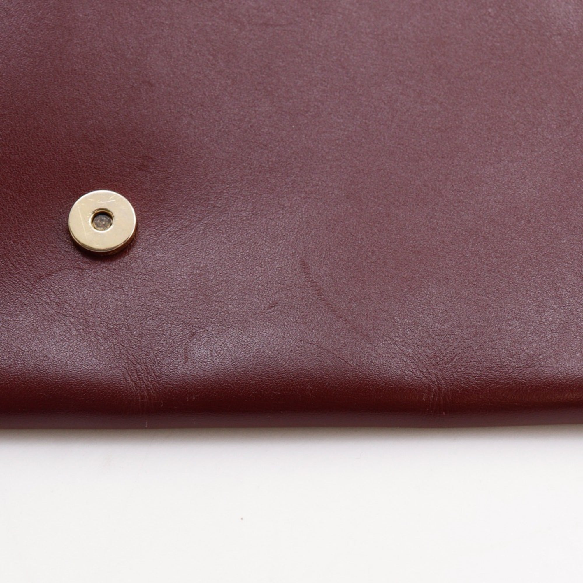 Cartier Must Bordeaux Leather Clutch Bag (Pre-Owned)