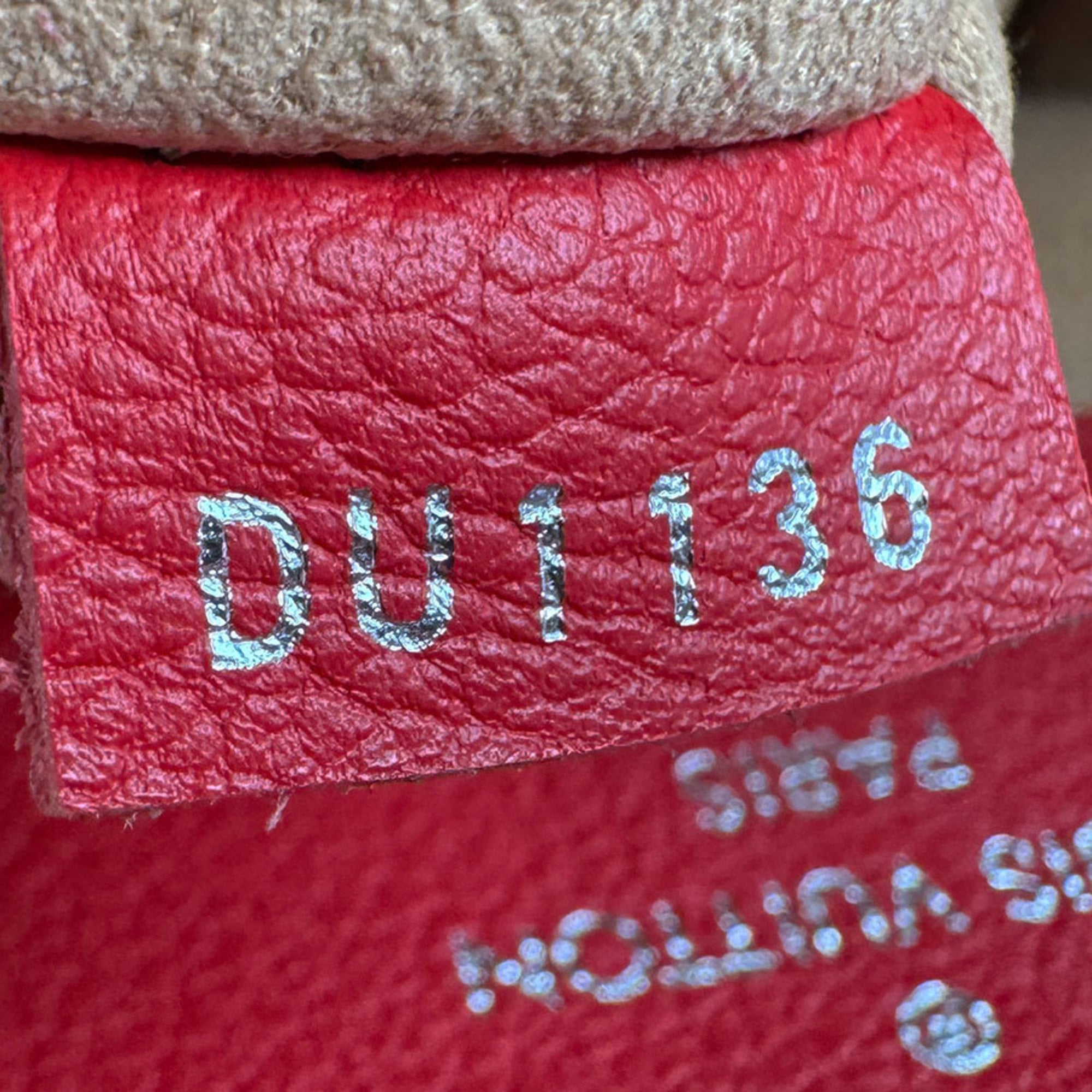 Louis Vuitton Ruby Leather Backpack (Pre-Owned)