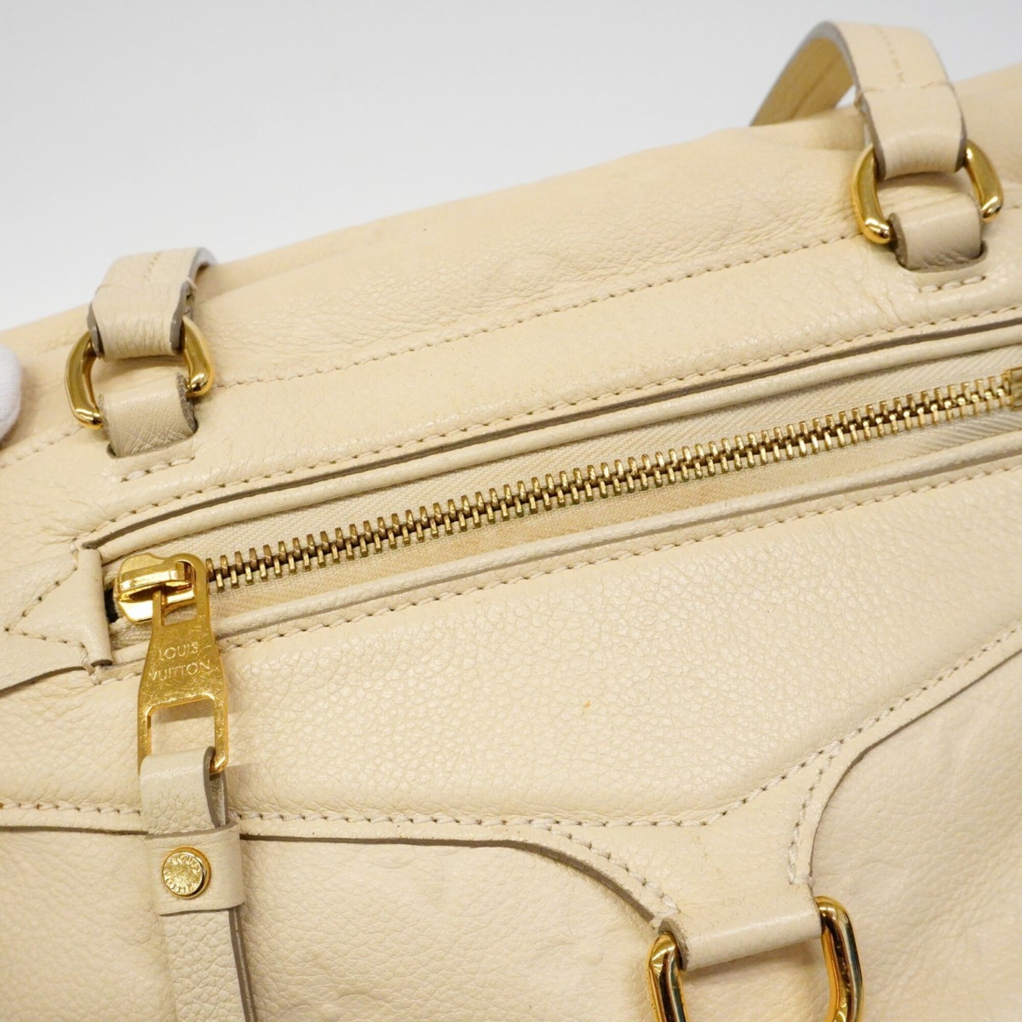 Louis Vuitton Neige Handbag (Pre-Owned)