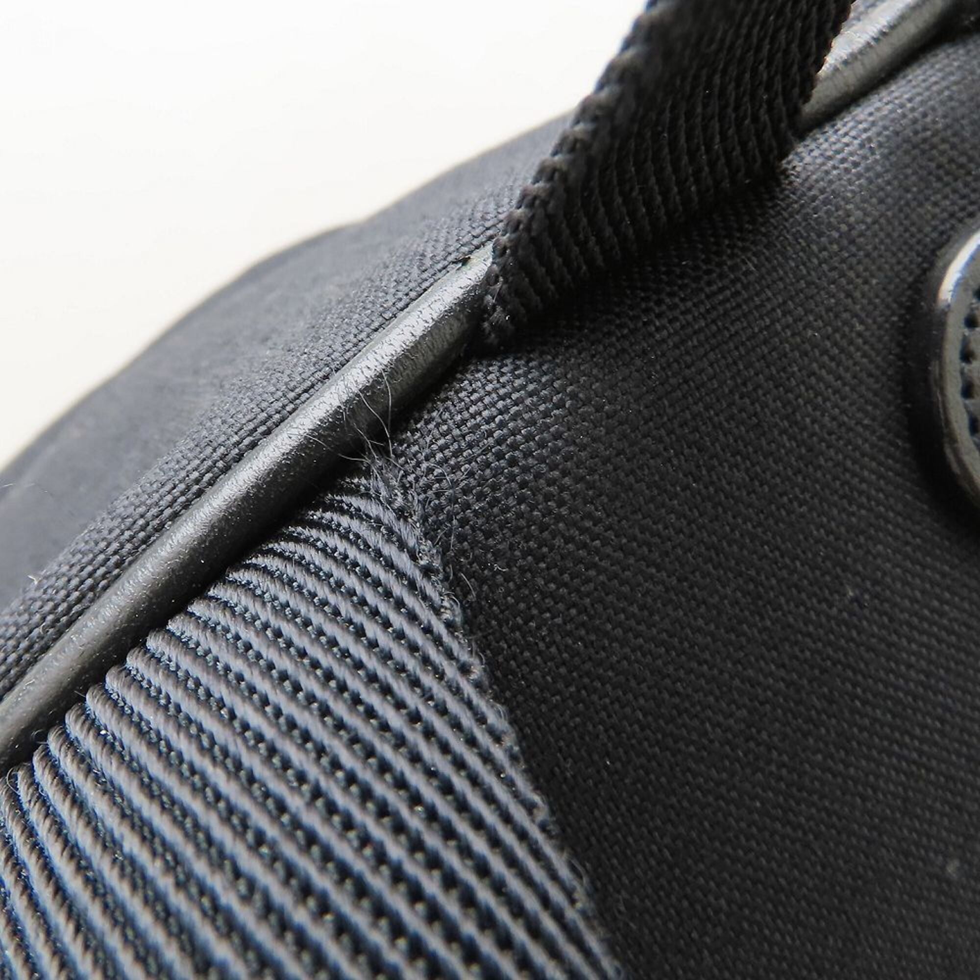 Yves Saint Laurent Black Canvas Leather Backpack (Pre-Owned)
