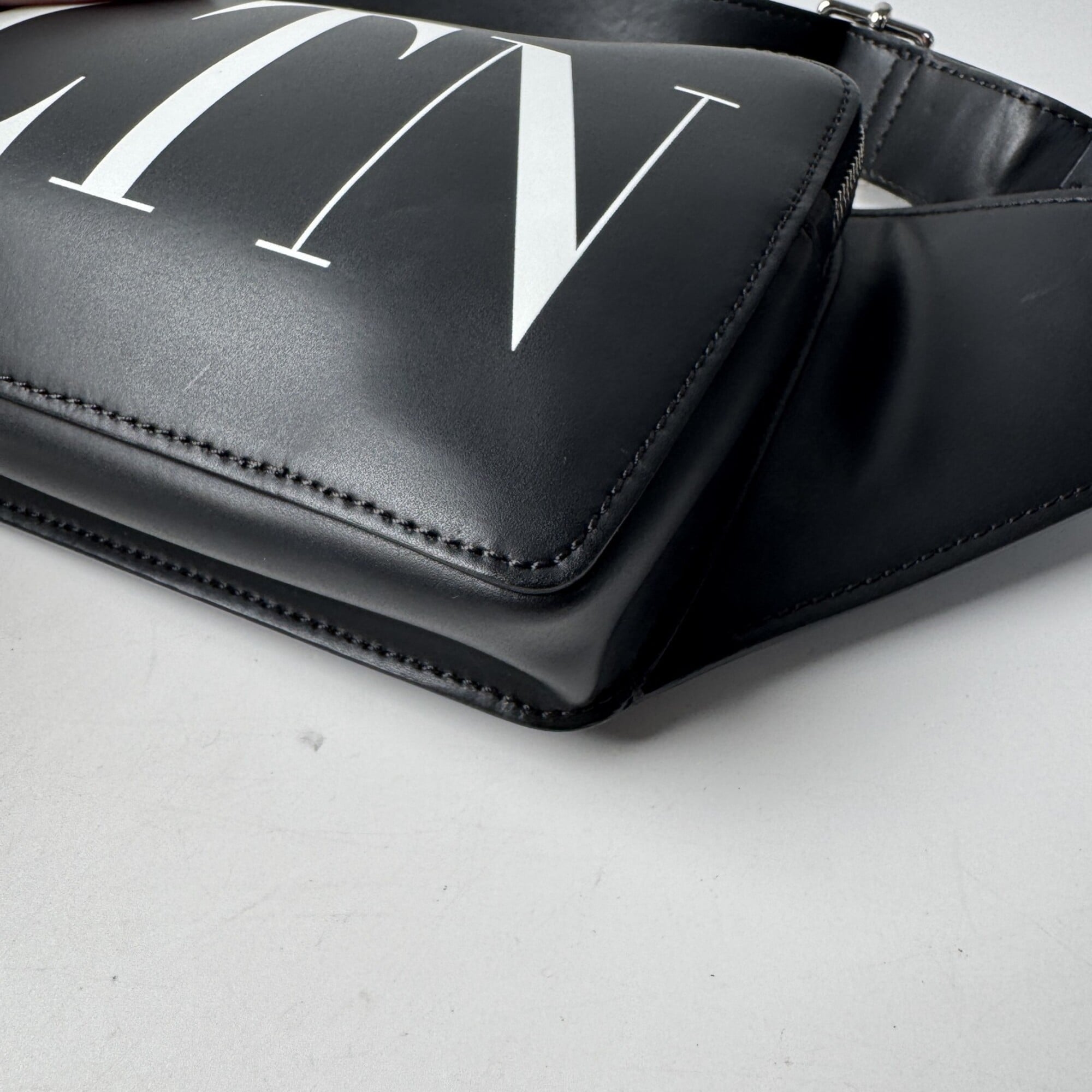 Valentino Garavani Black Leather Sling Bag (Pre-Owned)
