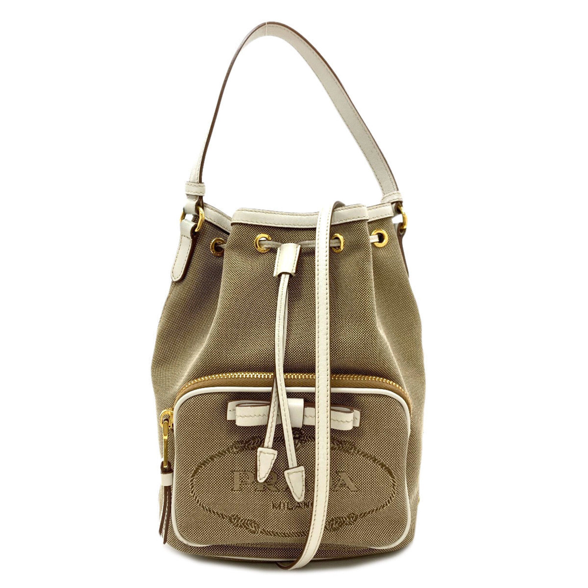 Prada Brown White Canvas Handbag (Pre-Owned)