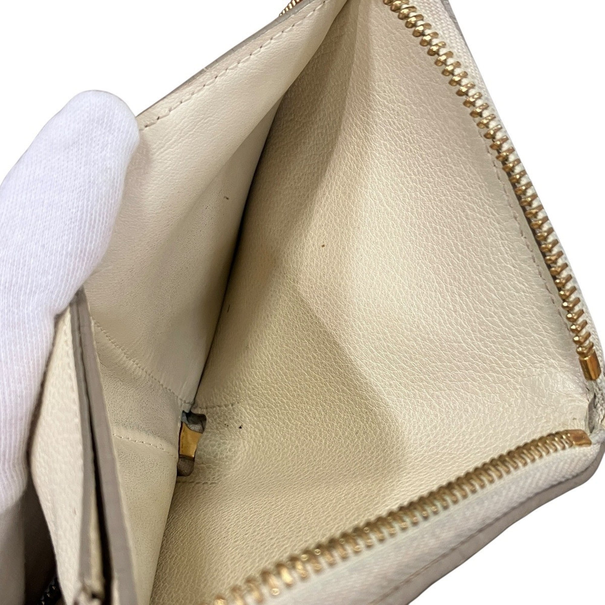 Louis Vuitton Neige Monogram Empreinte Leather Wallet (Bi-Fold) (Pre-Owned)