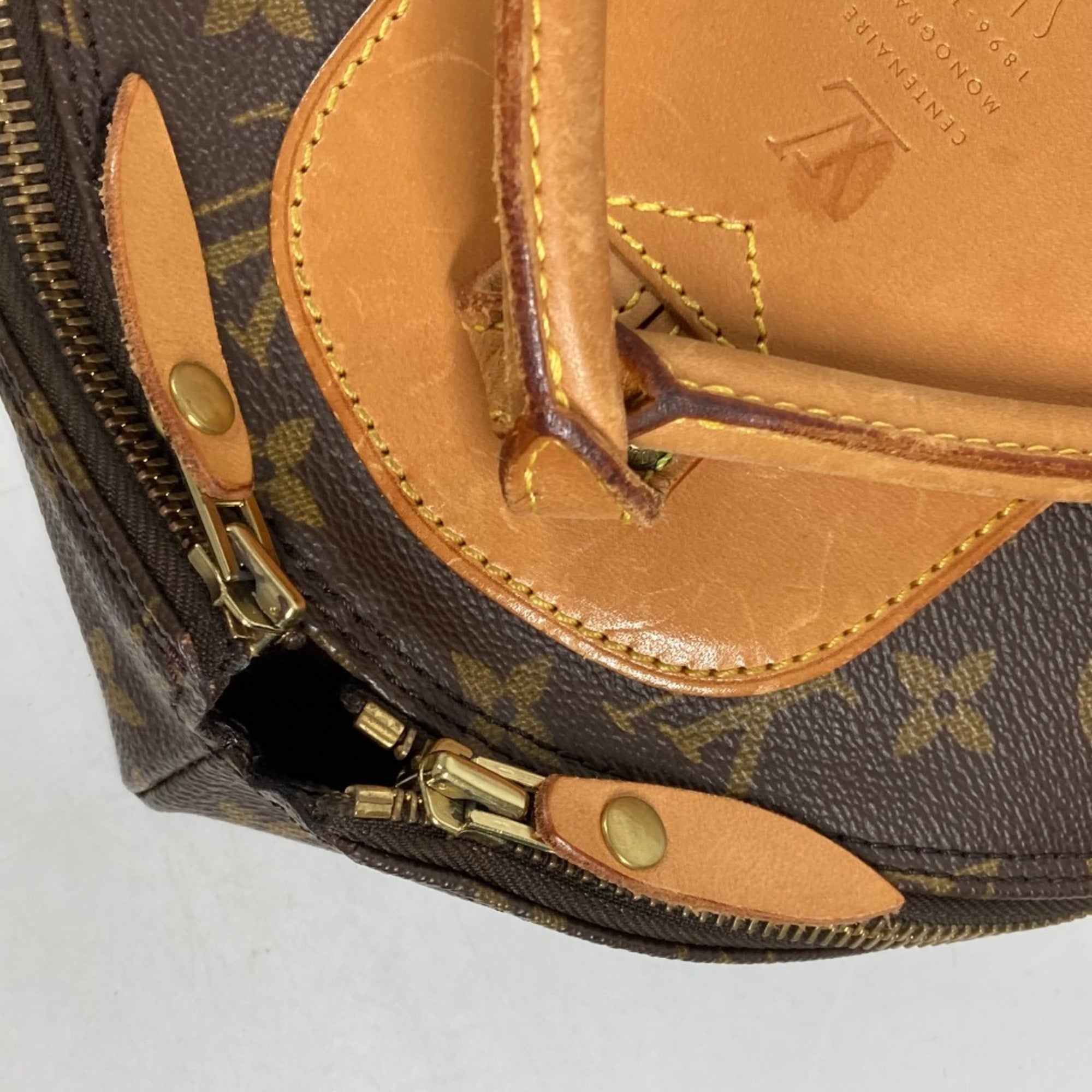 Louis Vuitton Brown Monogram Canvas Backpack (Pre-Owned)