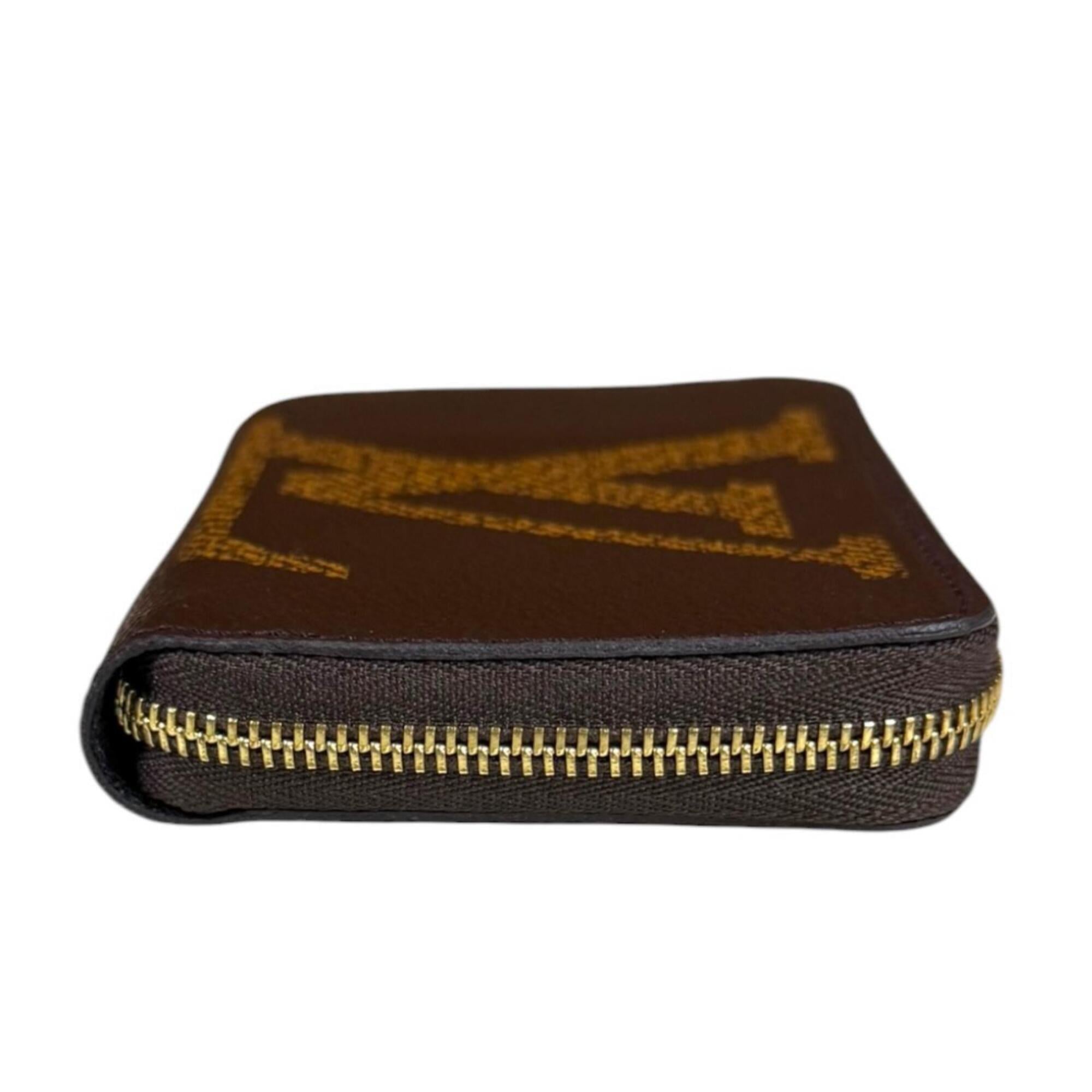 Louis Vuitton Brown Monogram Coin Purse/Coin Case (Pre-Owned)