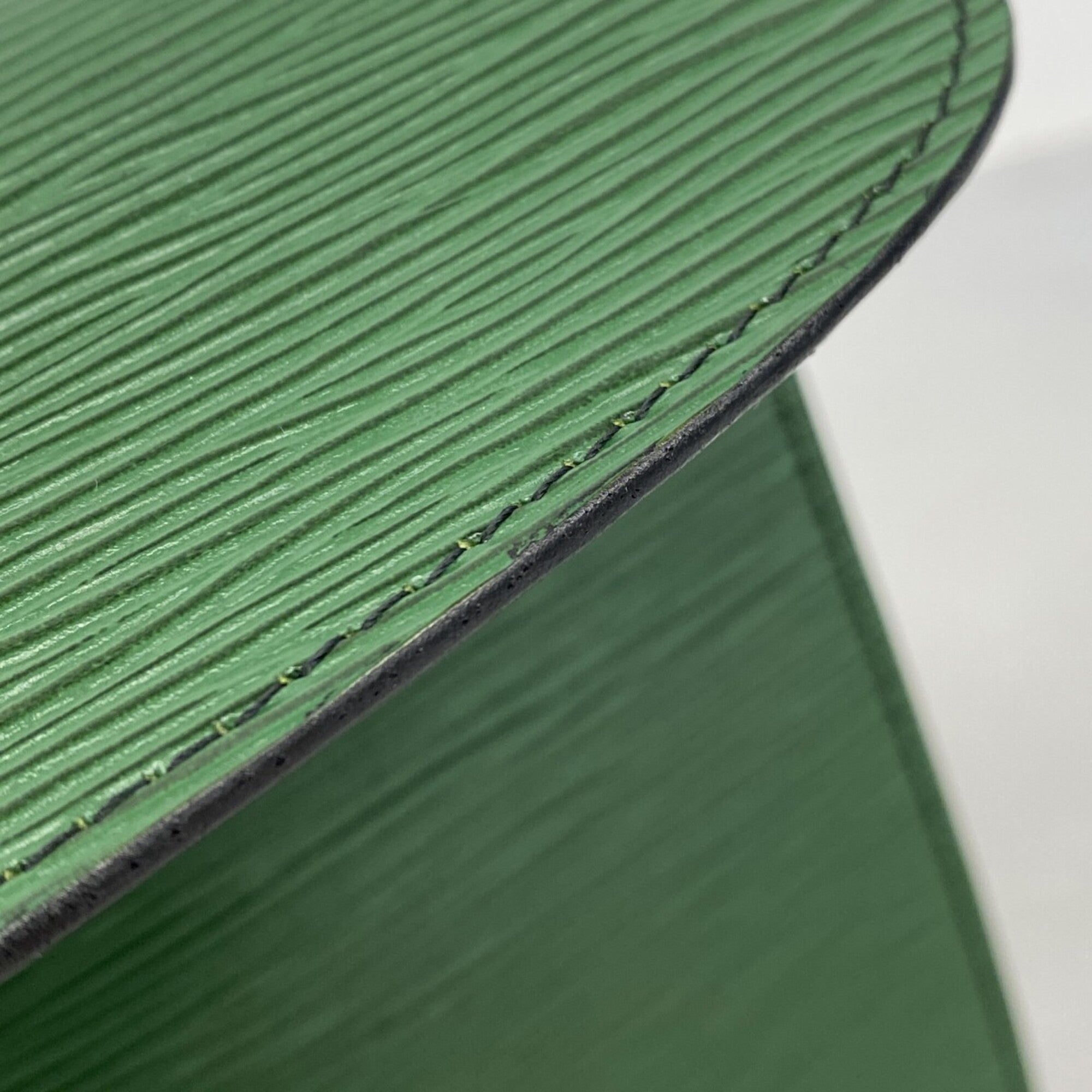 Louis Vuitton Borneo Green Clutch Bag (Pre-Owned)