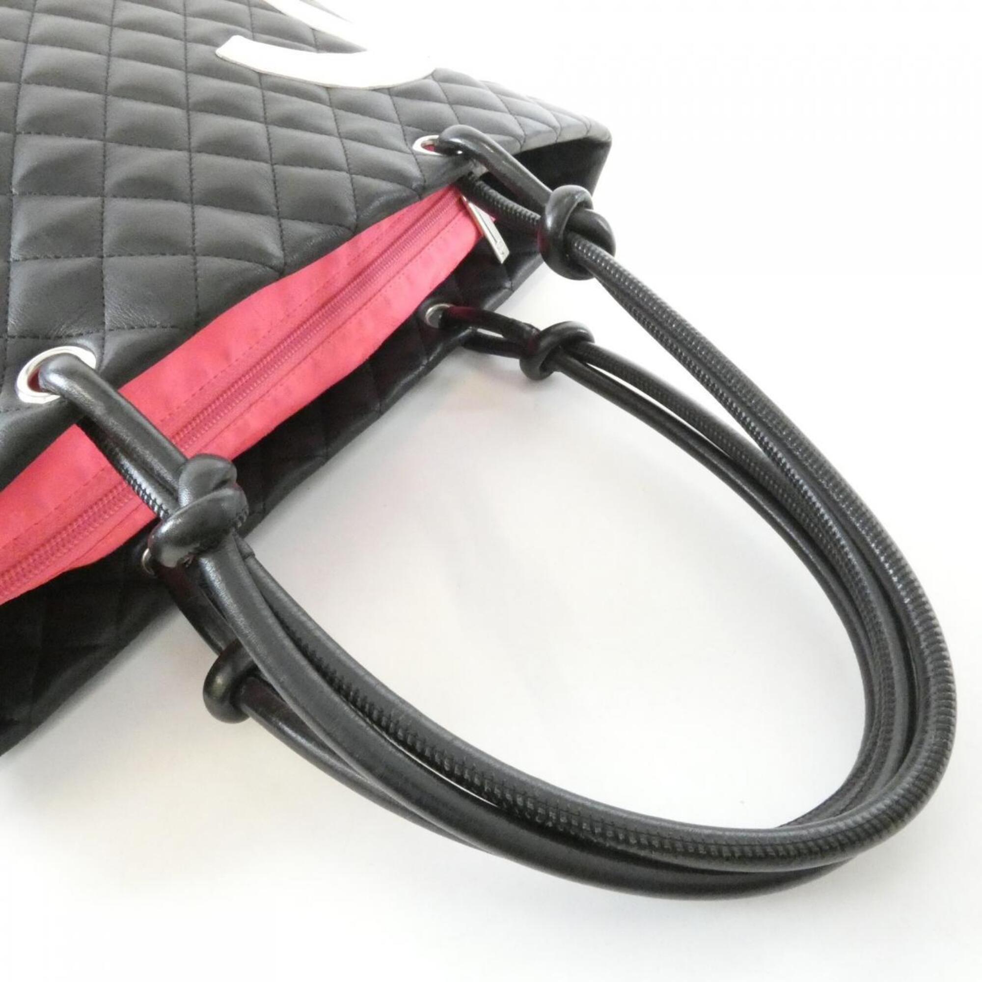 Chanel Black White Leather Handbag (Pre-Owned)