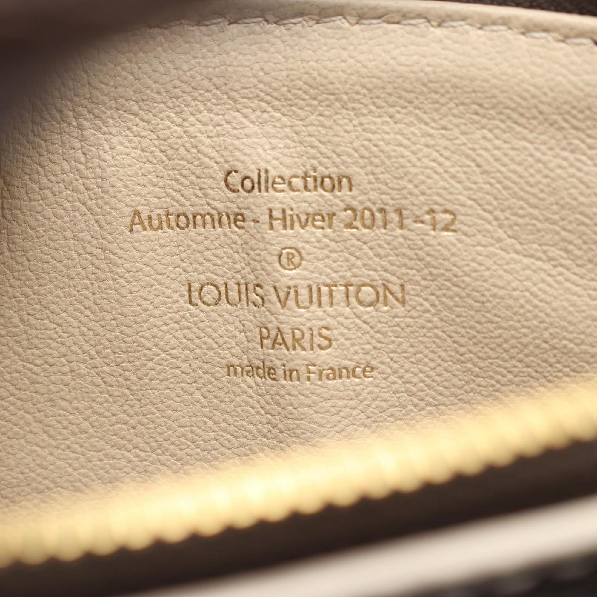 Louis Vuitton Brown Coated Canvas Handbag (Pre-Owned)