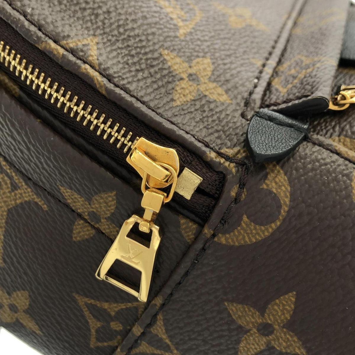 Louis Vuitton Brown Coated Canvas Backpack (Pre-Owned)