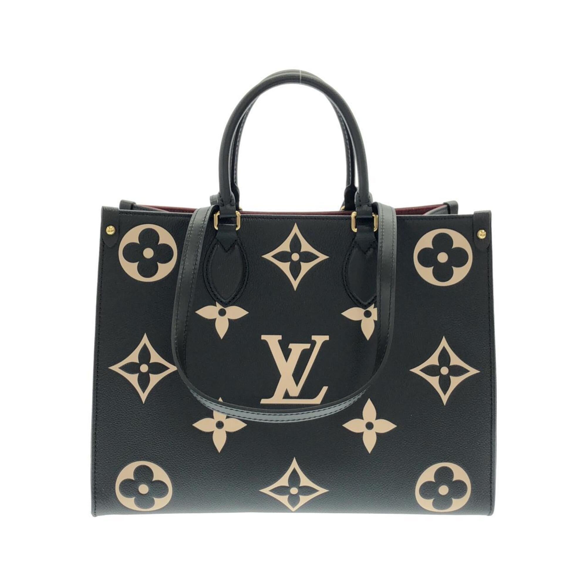 Louis Vuitton Beige Black Leather Handbag (Pre-Owned)