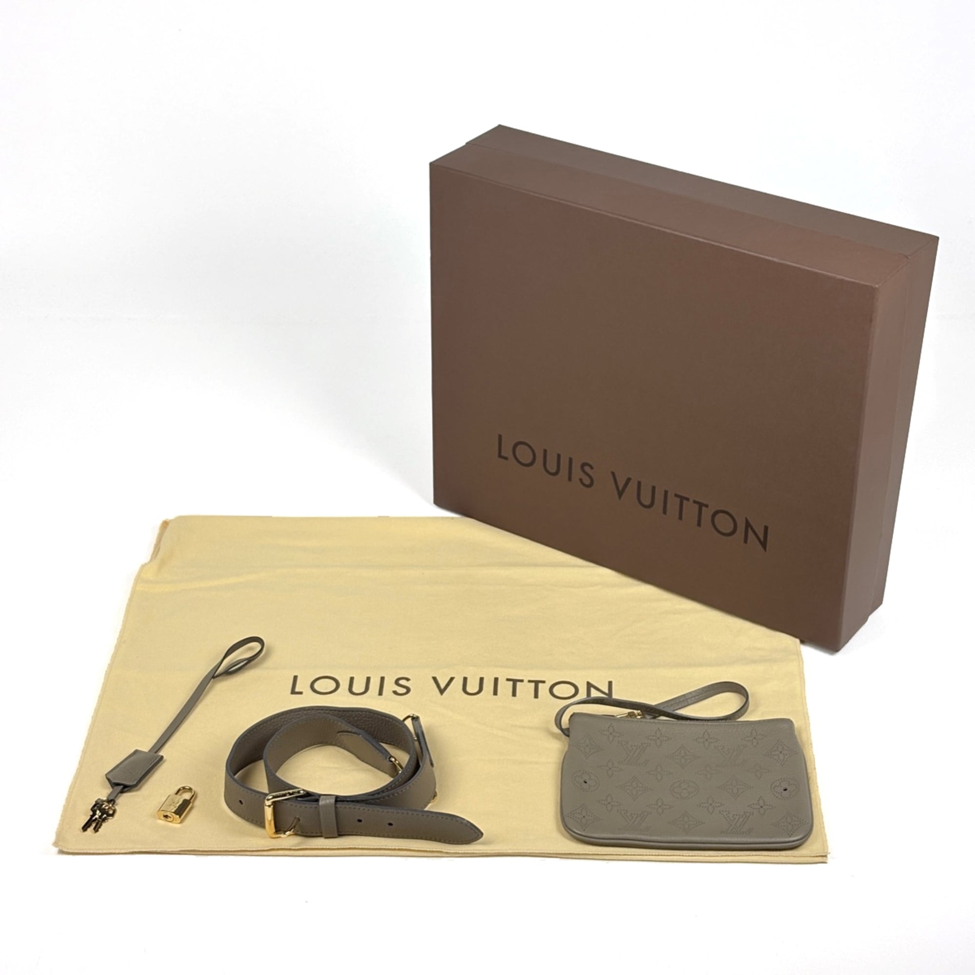 Louis Vuitton Mahina Taupe Mahina Leather Handbag (Pre-Owned)