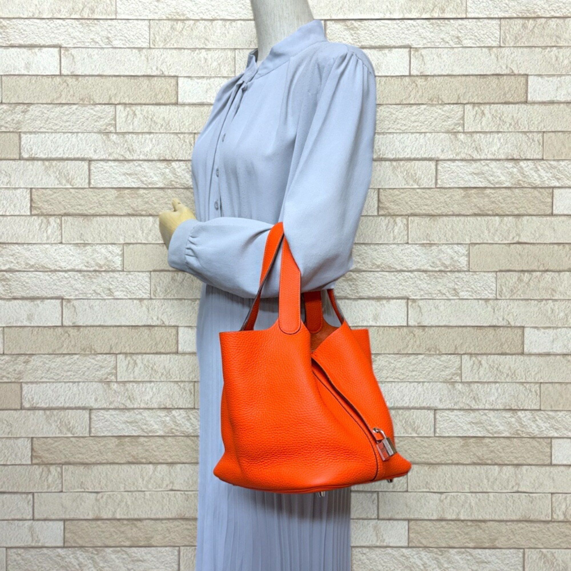 Hermes Orange Taurillon Clemence Leather Handbag (Pre-Owned)