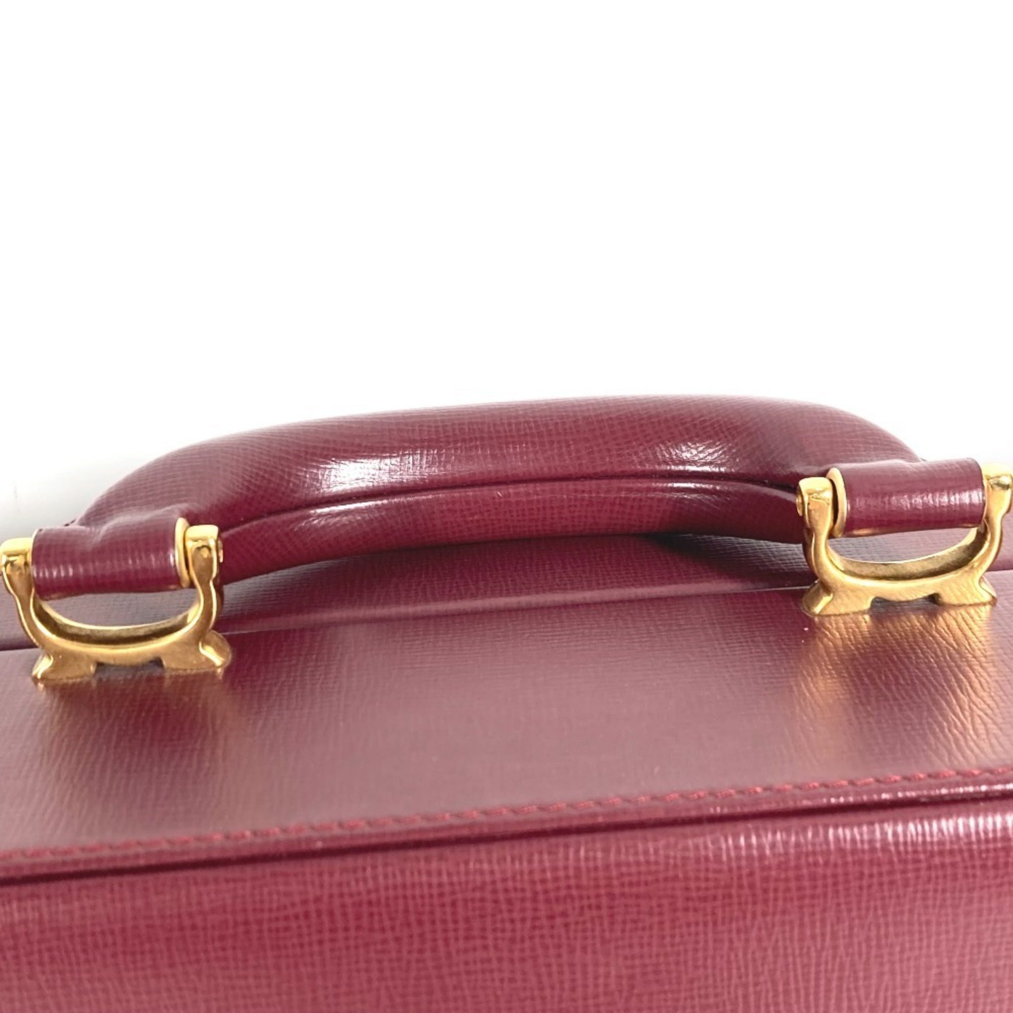 Cartier Wine Red Leather Handbag (Pre-Owned)