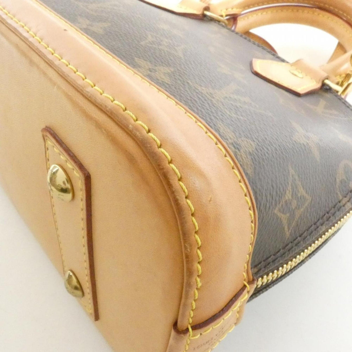 Louis Vuitton Brown Coated Canvas Handbag (Pre-Owned)