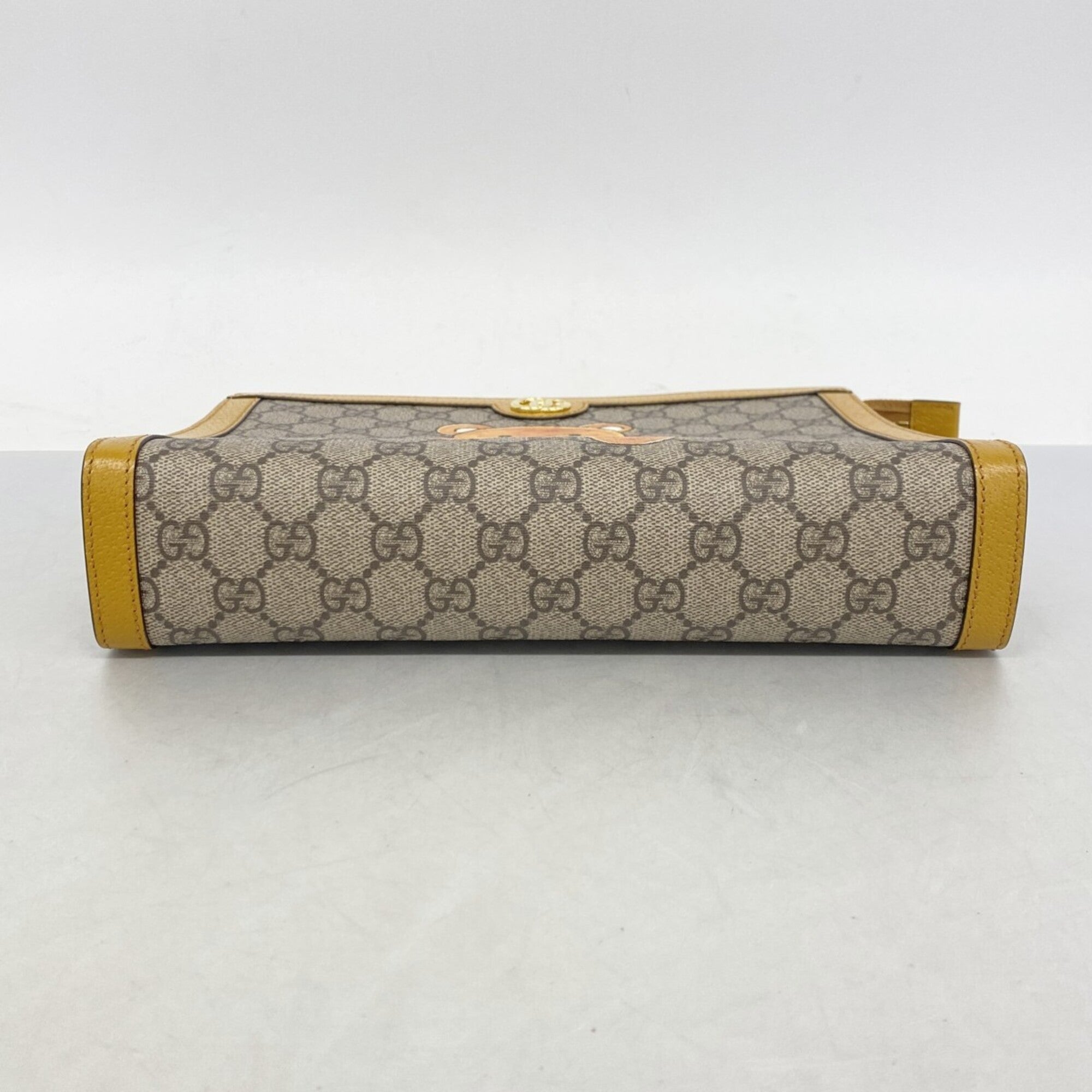 Gucci Brown Pvc Clutch Bag (Pre-Owned)