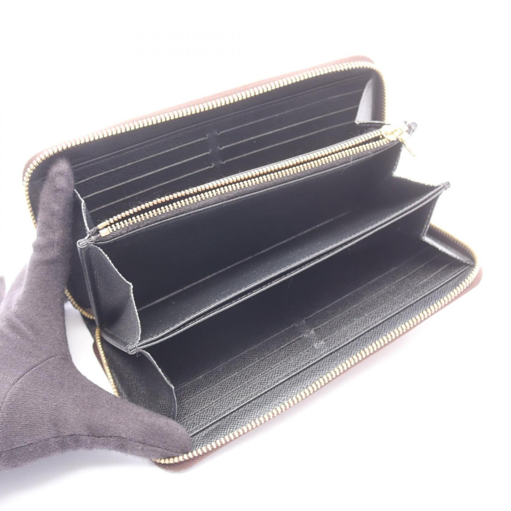 Louis Vuitton Brown Monogram Pvc Long Wallet (Bi-Fold) (Pre-Owned)