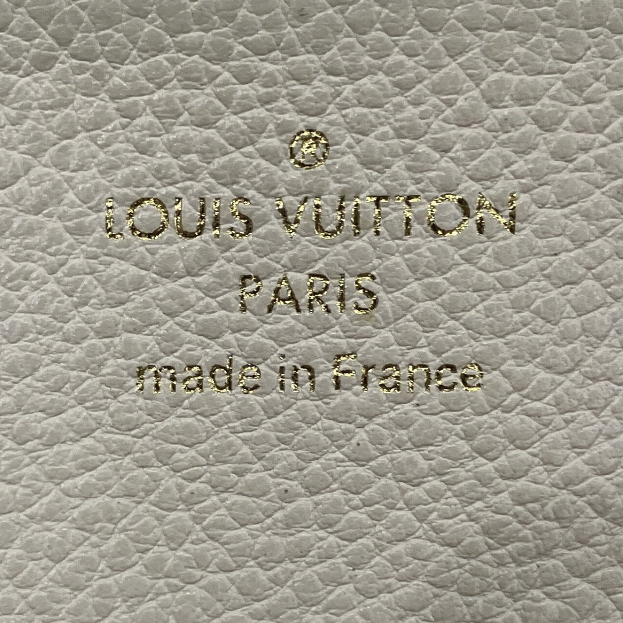 Louis Vuitton Neige Monogram Empreinte Leather Wallet (Bi-Fold) (Pre-Owned)