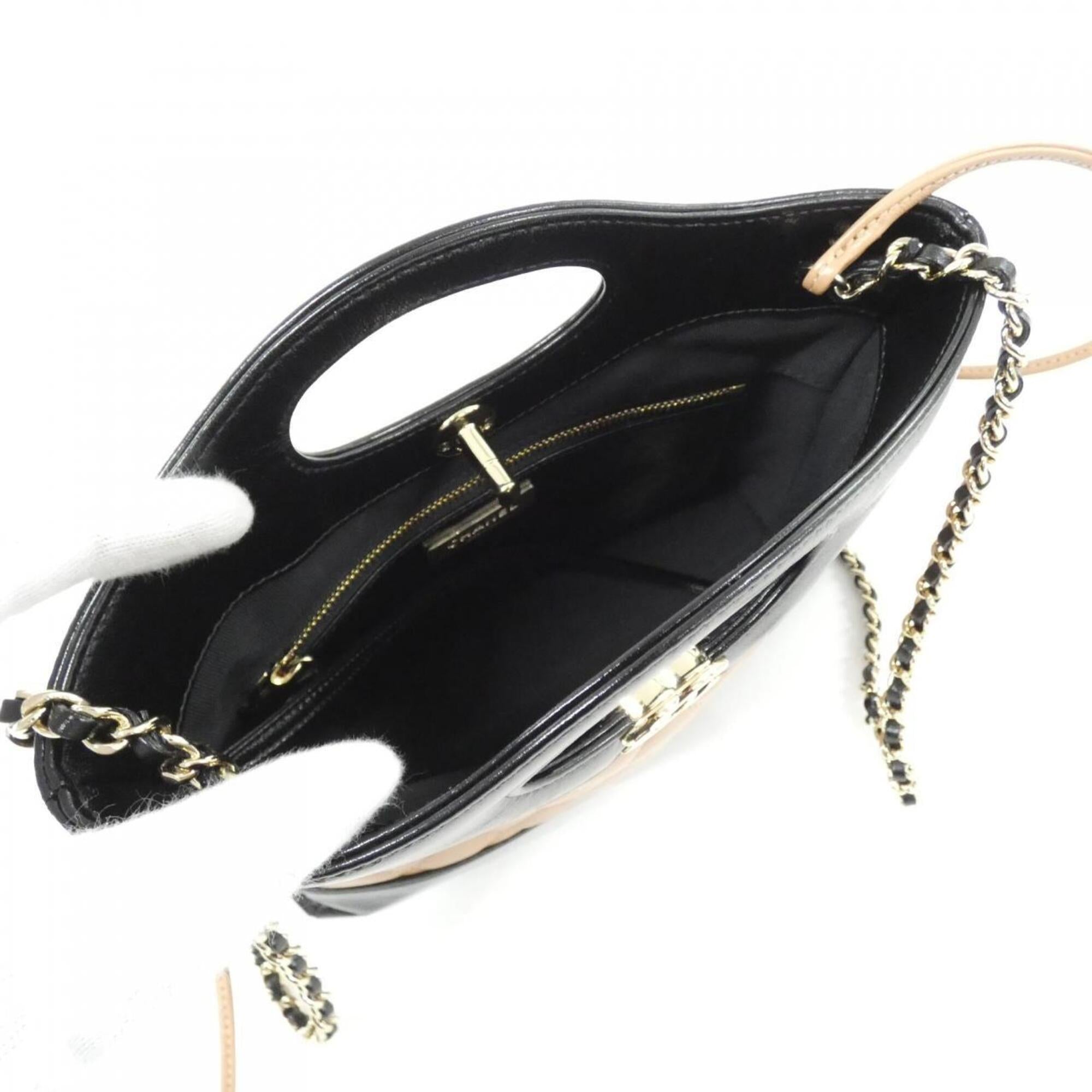 Chanel Beige Black Leather Handbag (Pre-Owned)
