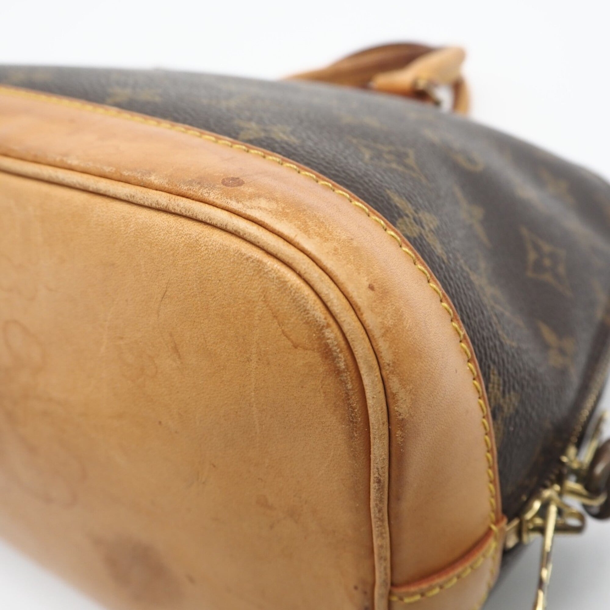 Louis Vuitton Brown Coated Canvas Leather Handbag (Pre-Owned)