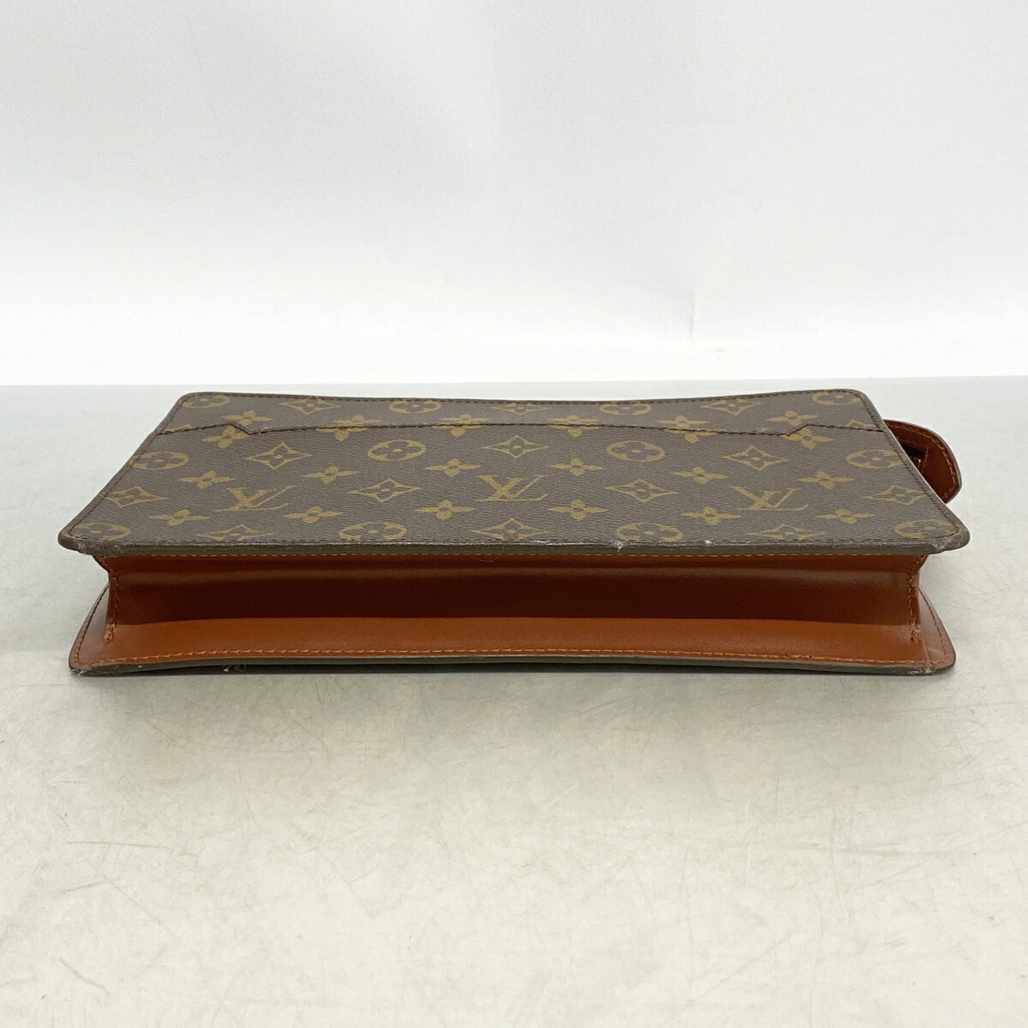 Louis Vuitton Brown Clutch Bag (Pre-Owned)