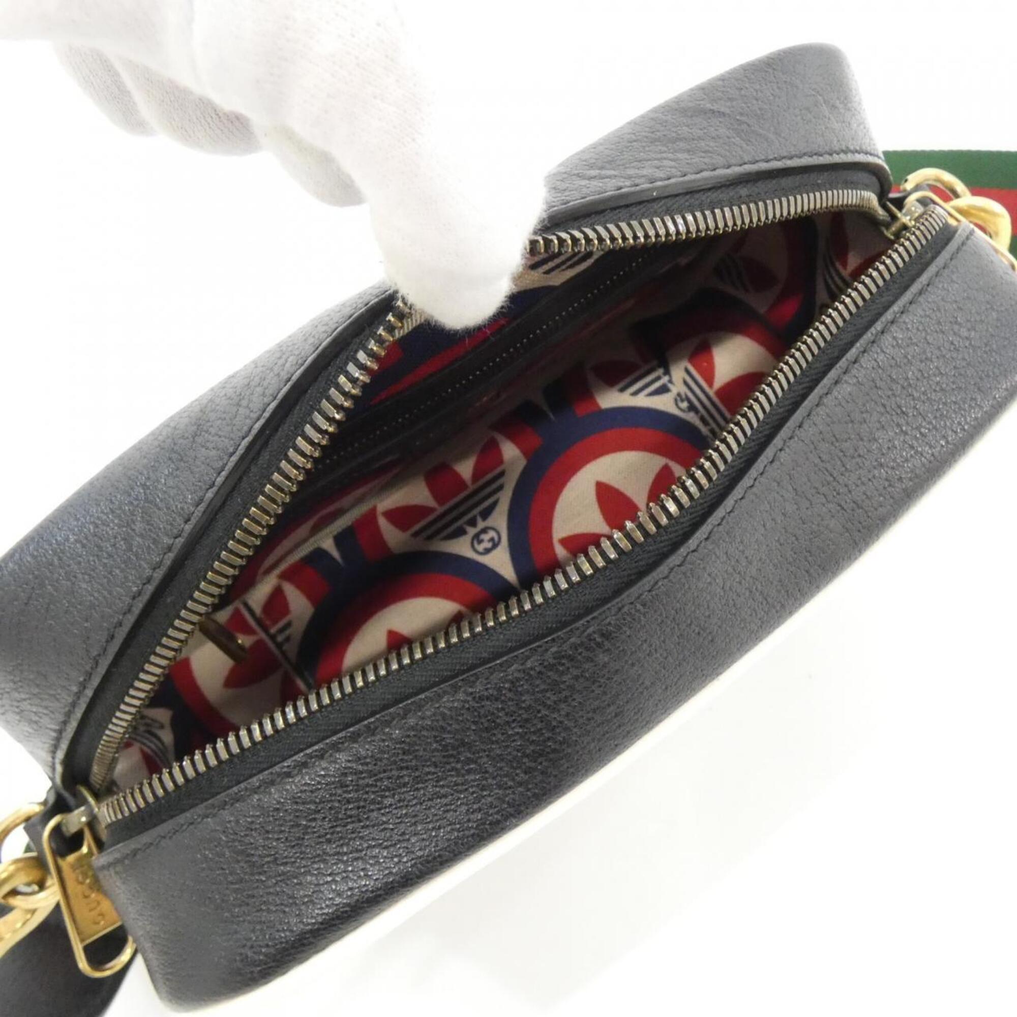 Gucci Black White Leather Shoulder Bag (Pre-Owned)