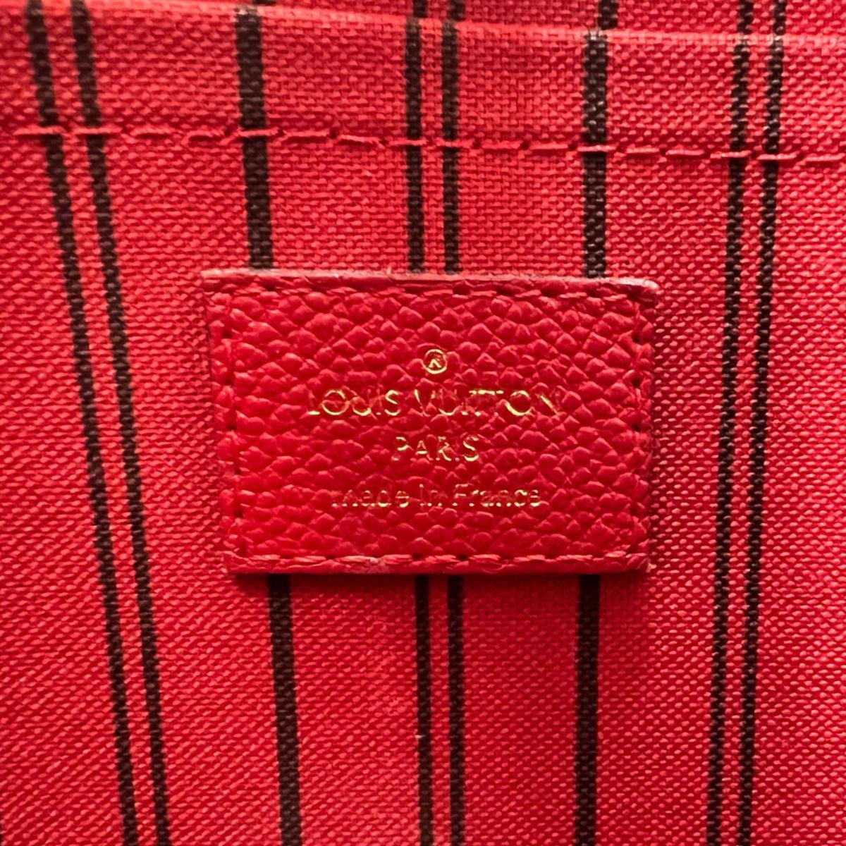 Louis Vuitton Red Color Monogram Empreinte Handbag (Pre-Owned)