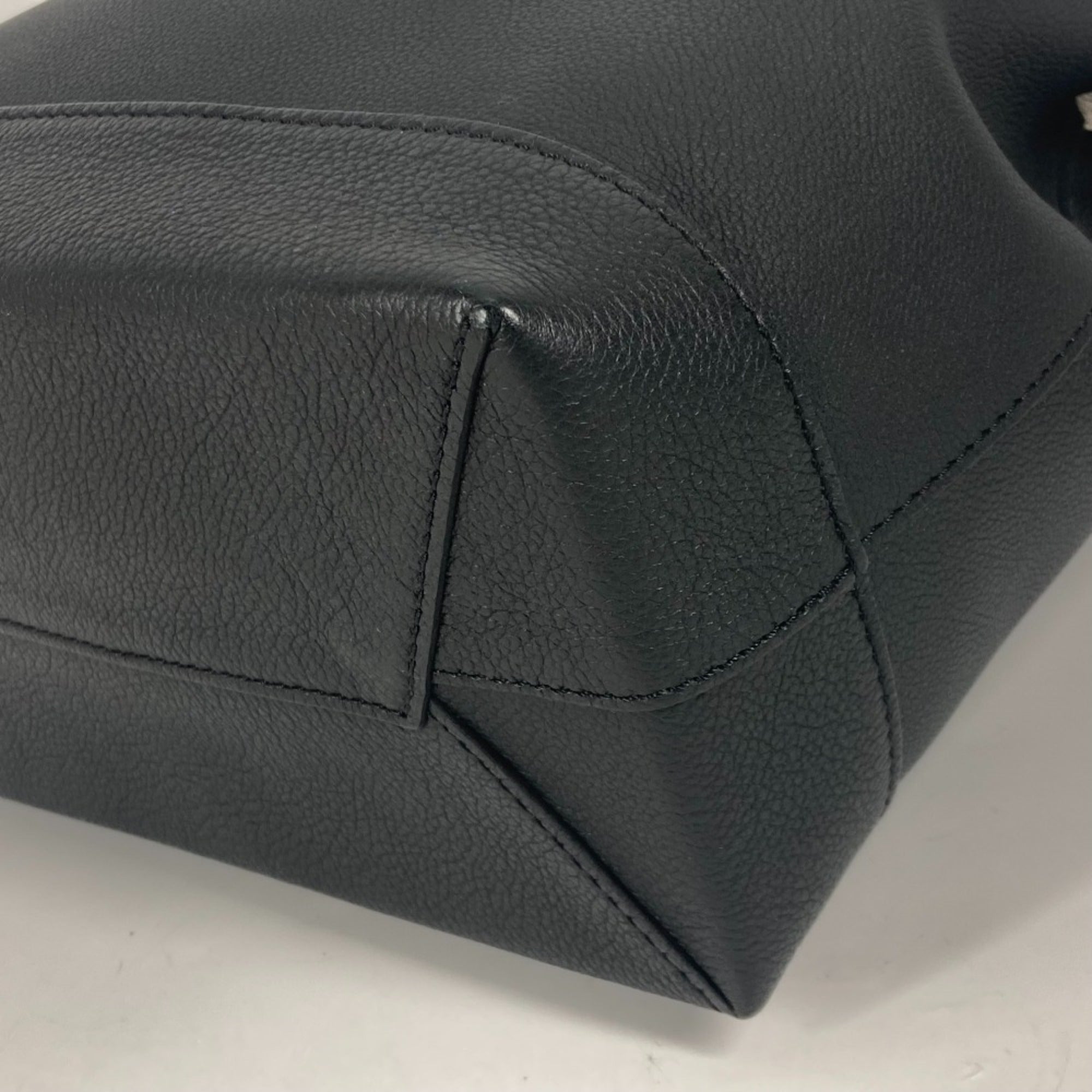 Louis Vuitton Black White Leather Backpack (Pre-Owned)