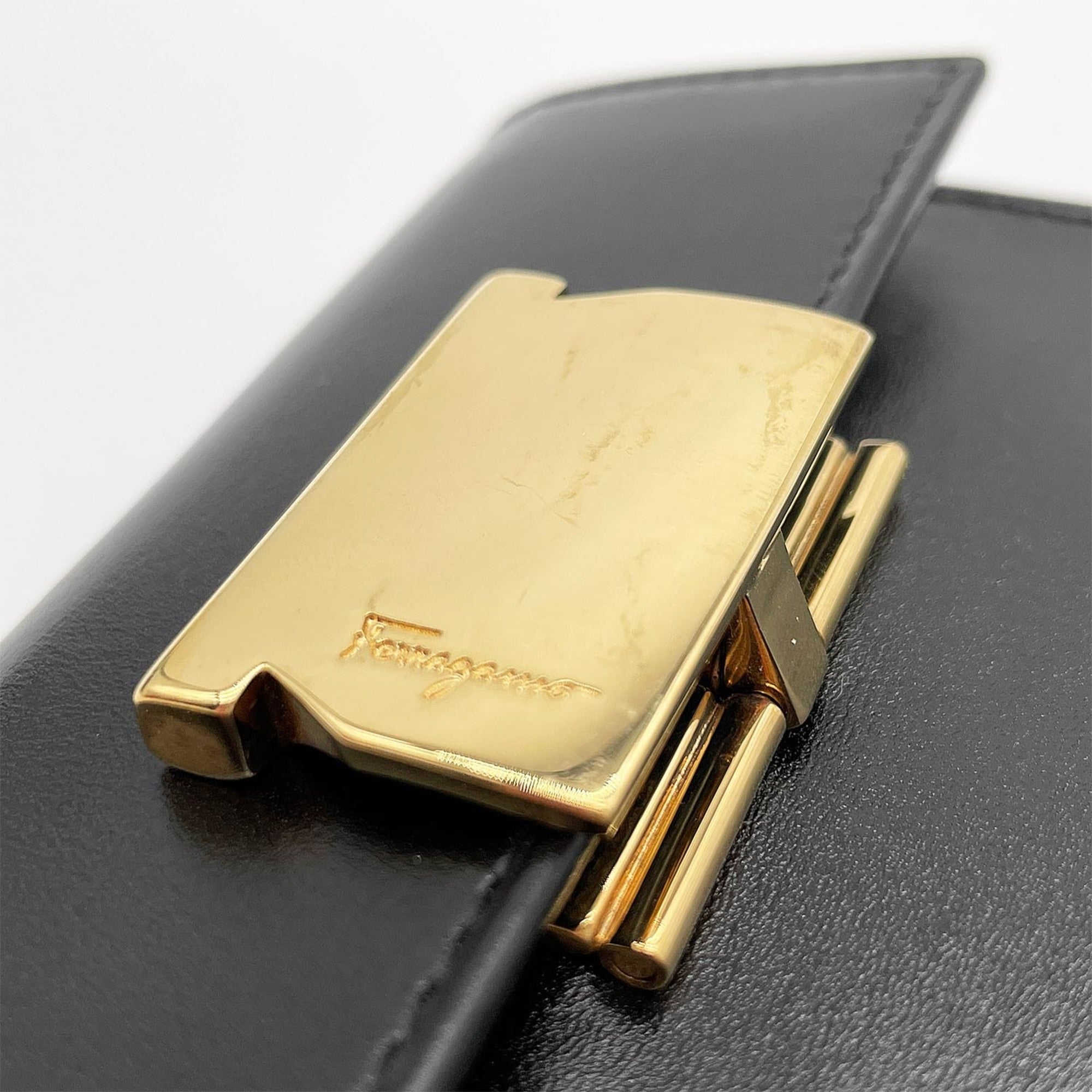 Salvatore Ferragamo Black Metal Leather Coin Purse/Coin Case (Pre-Owned)