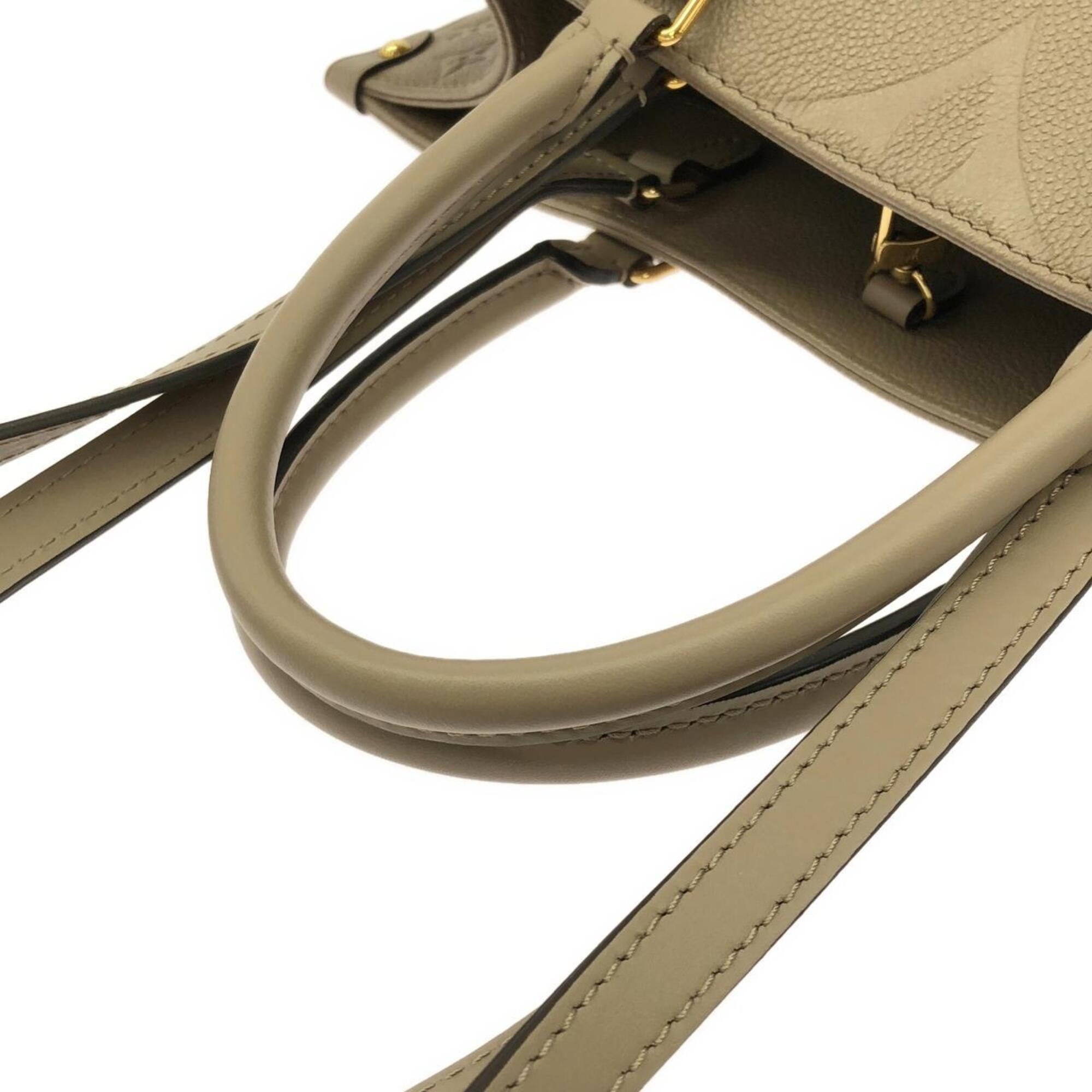 Louis Vuitton Tourterelle Leather Handbag (Pre-Owned)