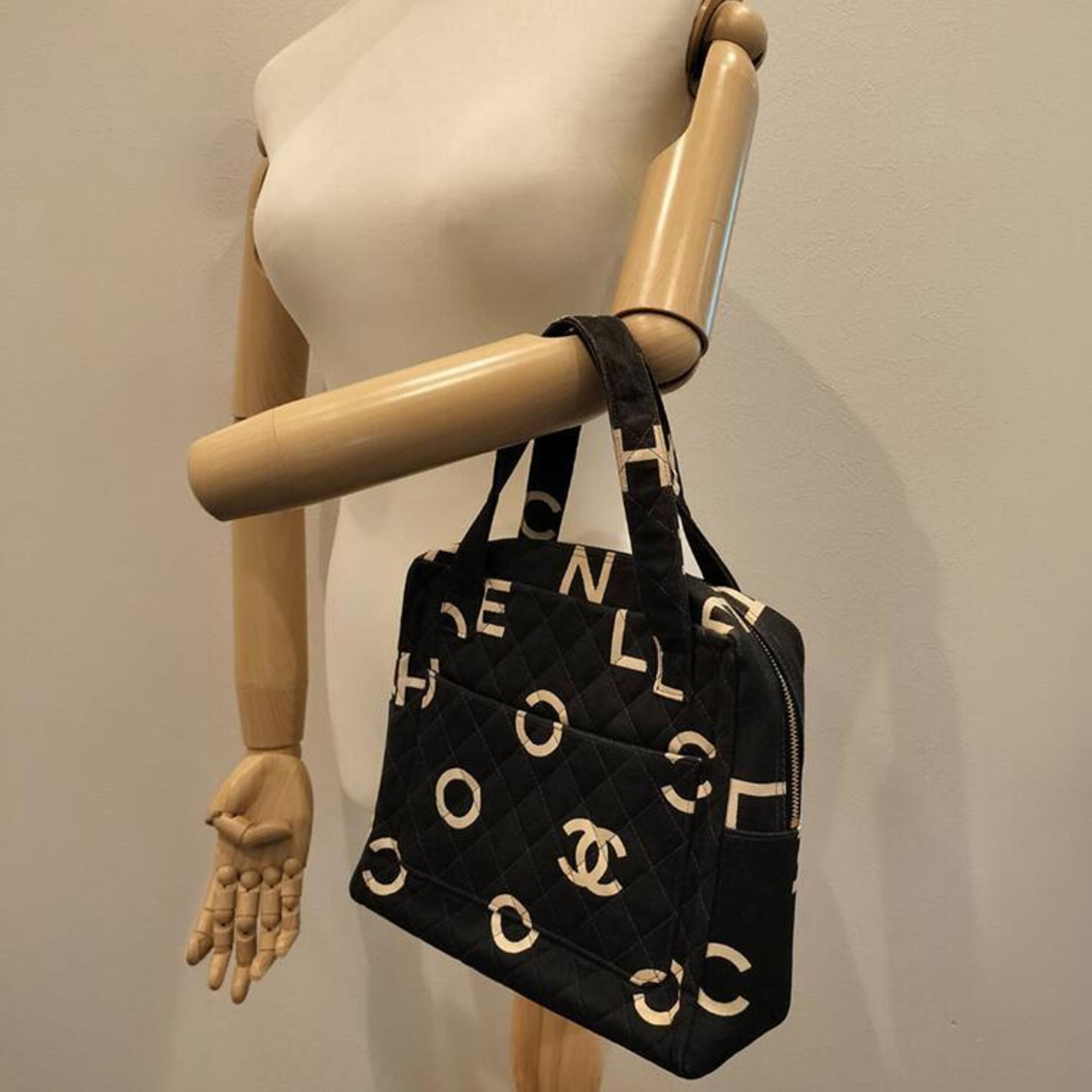Chanel Black White Canvas Handbag (Pre-Owned)