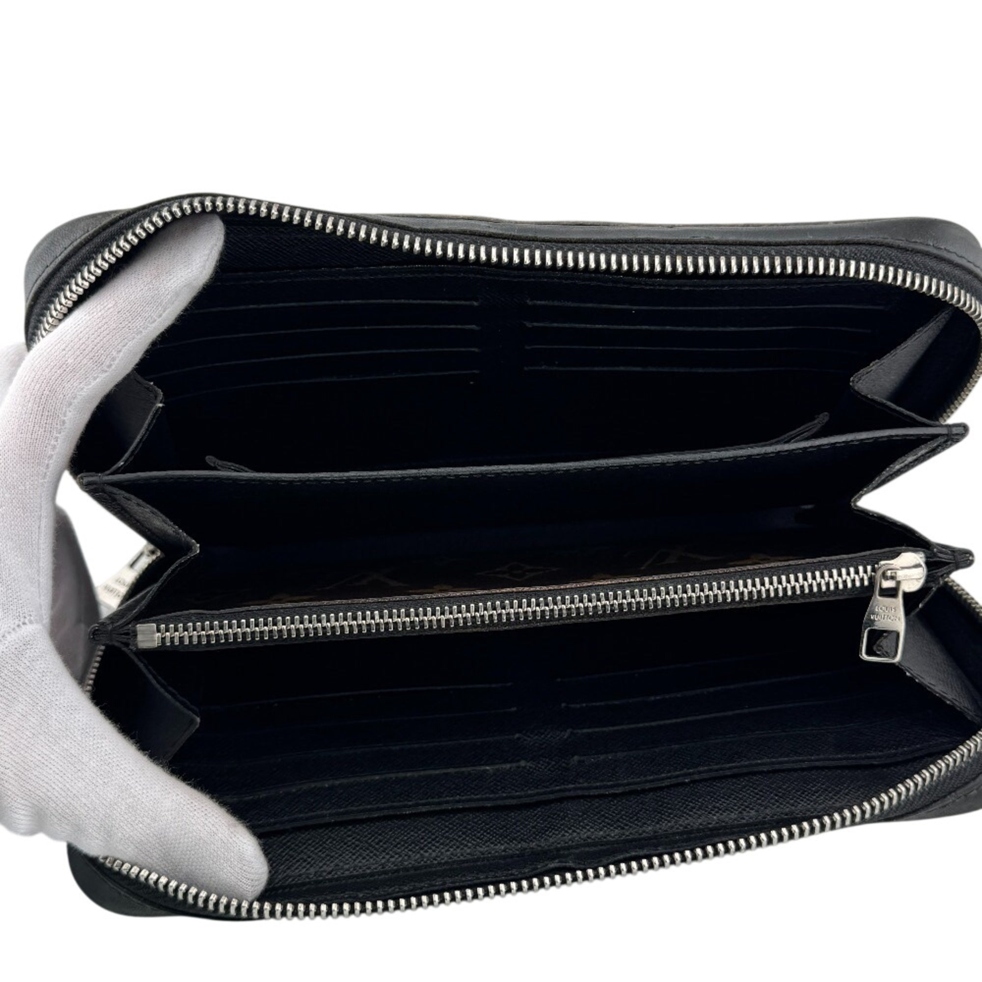 Louis Vuitton Brown Leather Clutch Bag (Pre-Owned)