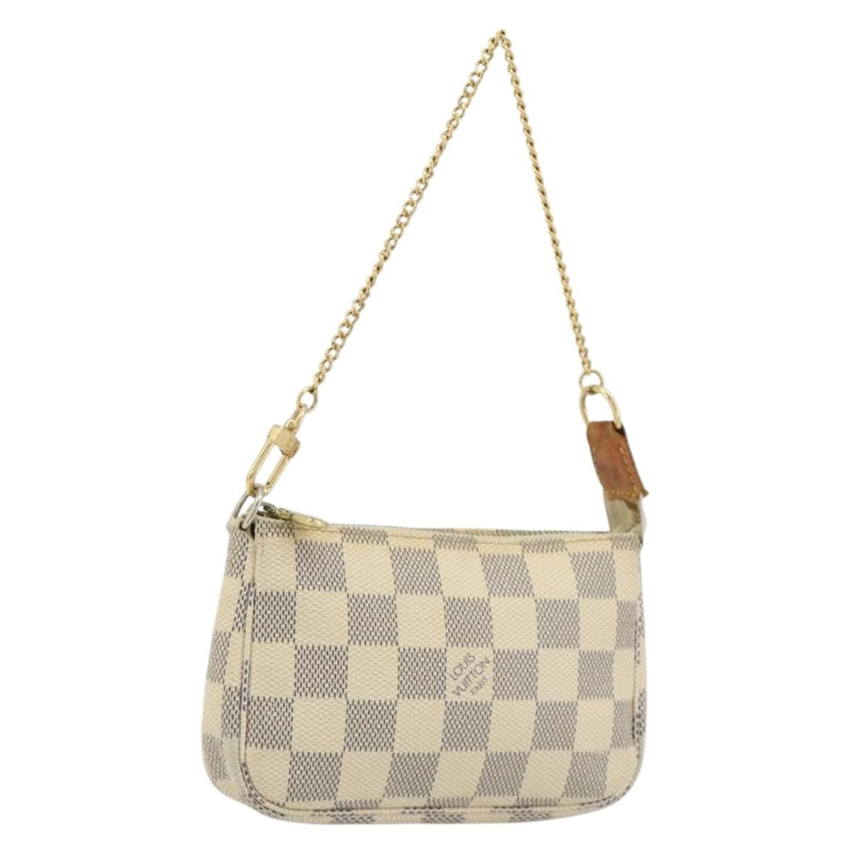 Louis Vuitton Mini Pochette Accessoires Damier Canvas Beige Canvas Clutche & Pouche Bag (Pre-Owned)