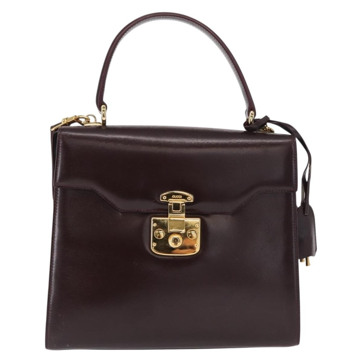 Gucci Vintage Lady Lock Top Handle Leather Burgundy Leather Handbag (Pre-Owned)